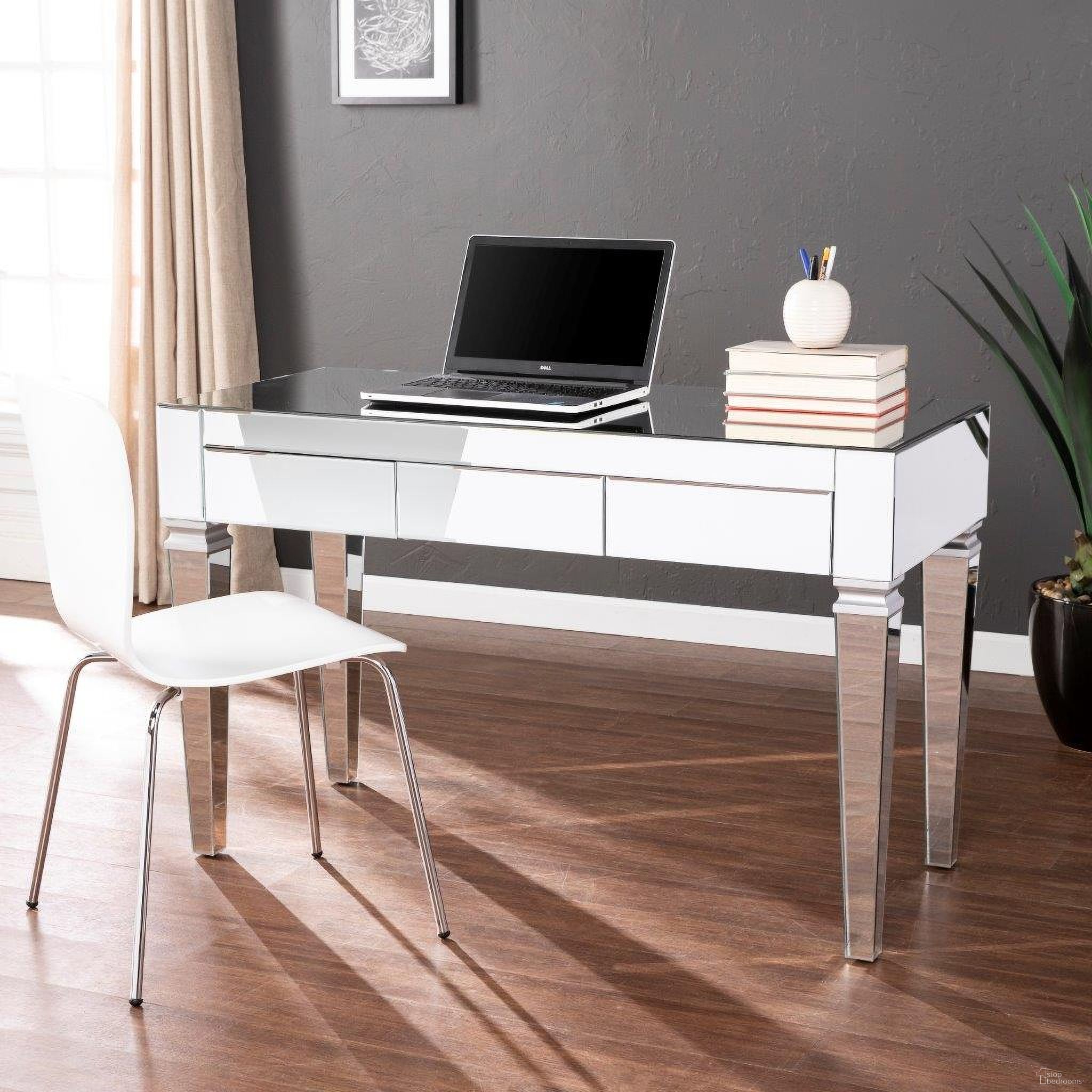 The appearance of Darien Mirrored Glam Desk In Silver designed by SEI Furniture in the modern / contemporary interior design. This silver piece of furniture  was selected by 1StopBedrooms from Darien Collection to add a touch of cosiness and style into your home. Sku: HO3694. Material: Wood.
