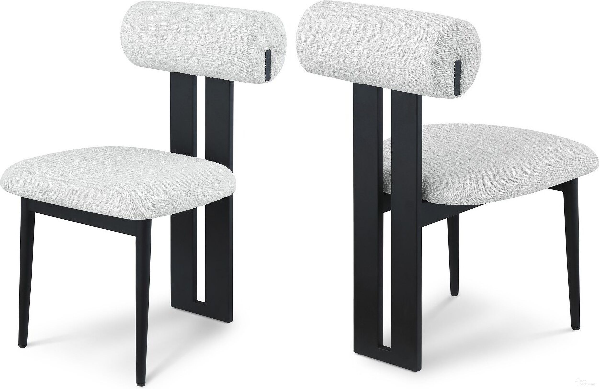 The appearance of Dario Boucle Fabric Dining Chair Set of 2 In Cream/Matte Black designed by Meridian in the modern / contemporary interior design. This cream piece of furniture was selected by 1StopBedrooms from Dario Collection to add a touch of cosiness and style into your home. Sku: 921Cream-C. Material: Wood. Chair Type: Side Chair.