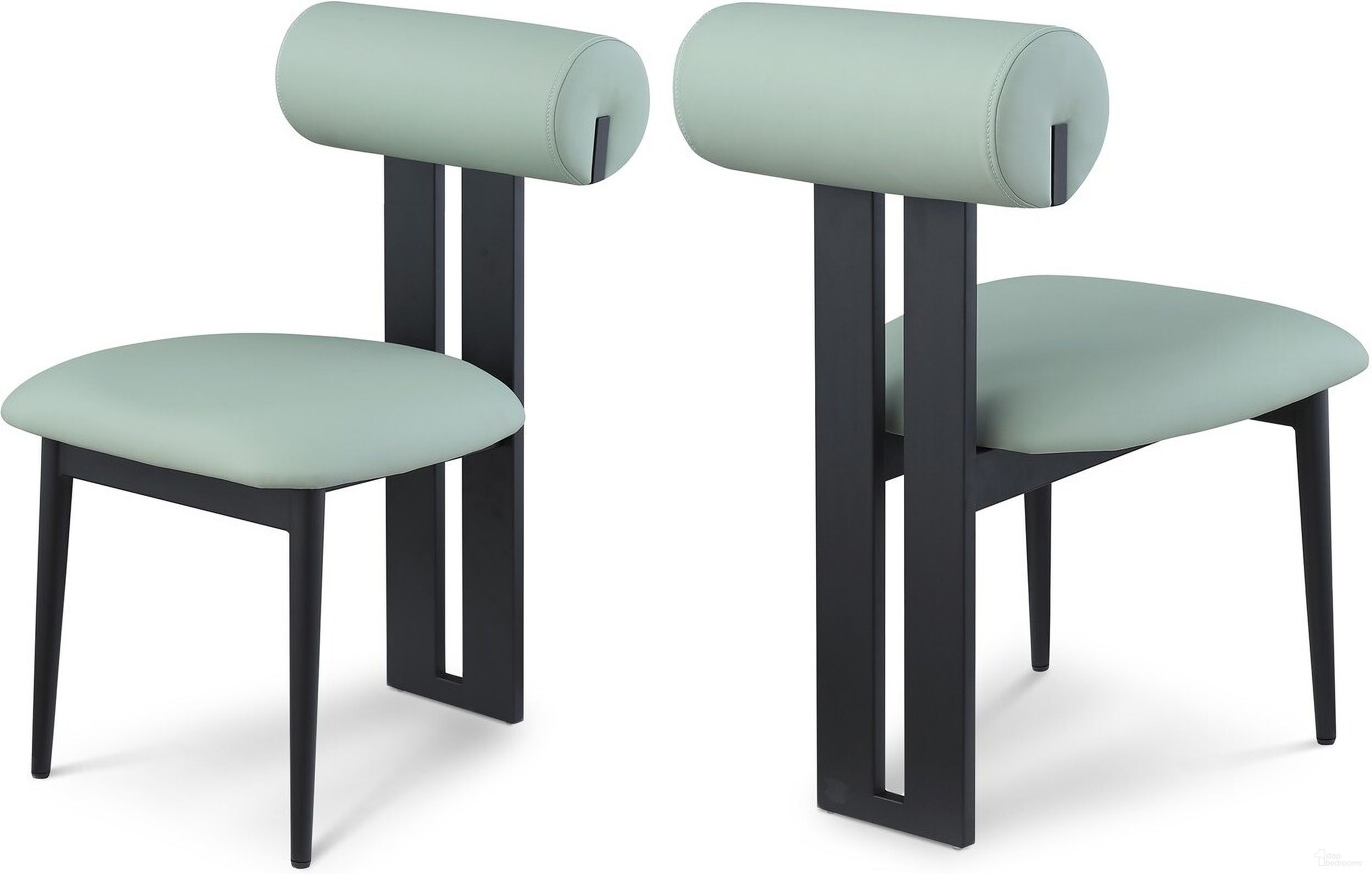 The appearance of Dario Vegan Leather Dining Chair Set of 2 In Mint designed by Meridian in the modern / contemporary interior design. This mint piece of furniture was selected by 1StopBedrooms from Dario Collection to add a touch of cosiness and style into your home. Sku: 922Mint-C. Material: Wood. Chair Type: Side Chair.