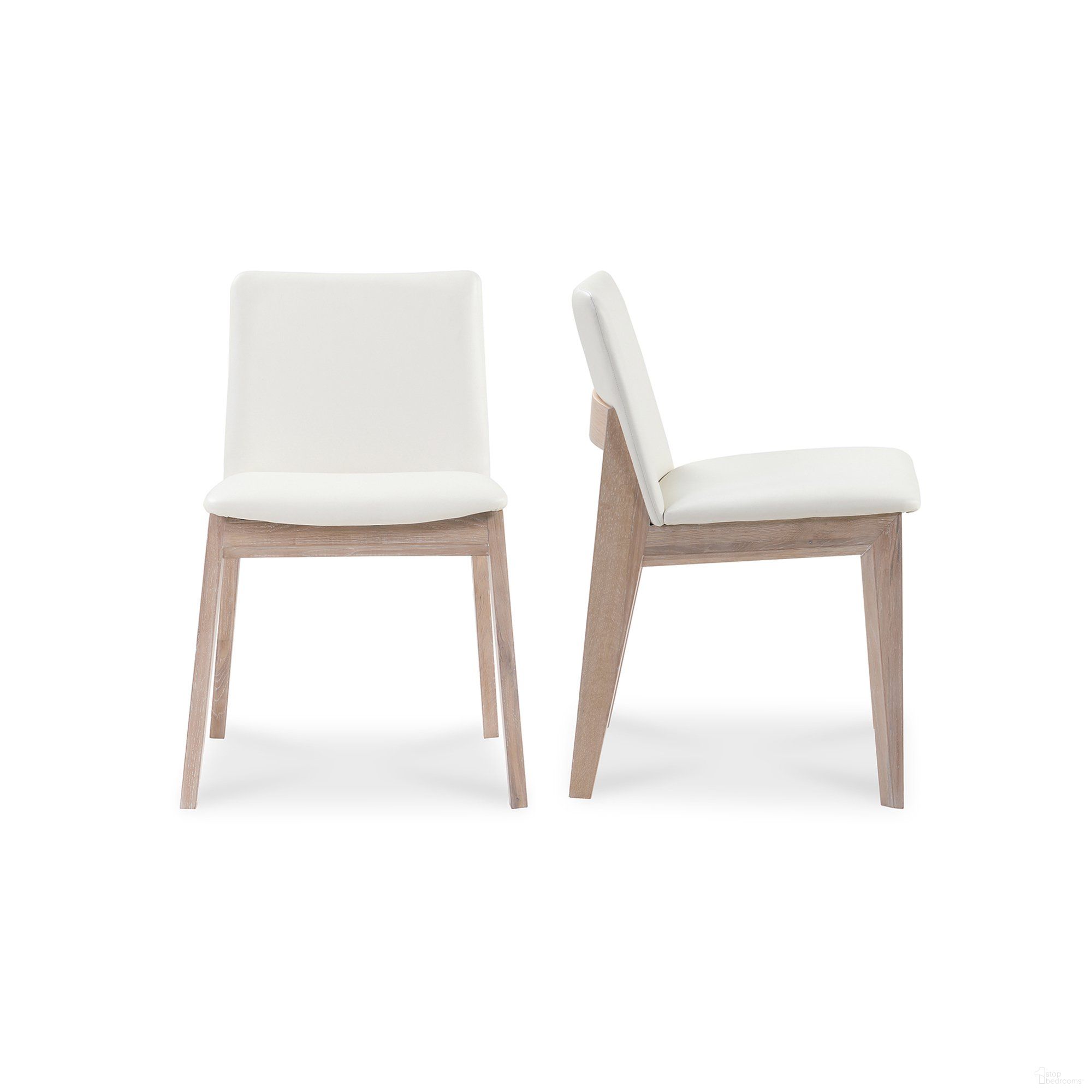 The appearance of Deco Oak Dining Chair Set Of 2 In White designed by Moes Home in the transitional interior design. This white piece of furniture was selected by 1StopBedrooms from Deco Collection to add a touch of cosiness and style into your home. Sku: BC-1086-05. Material: Faux Leather. Chair Type: Side Chair.