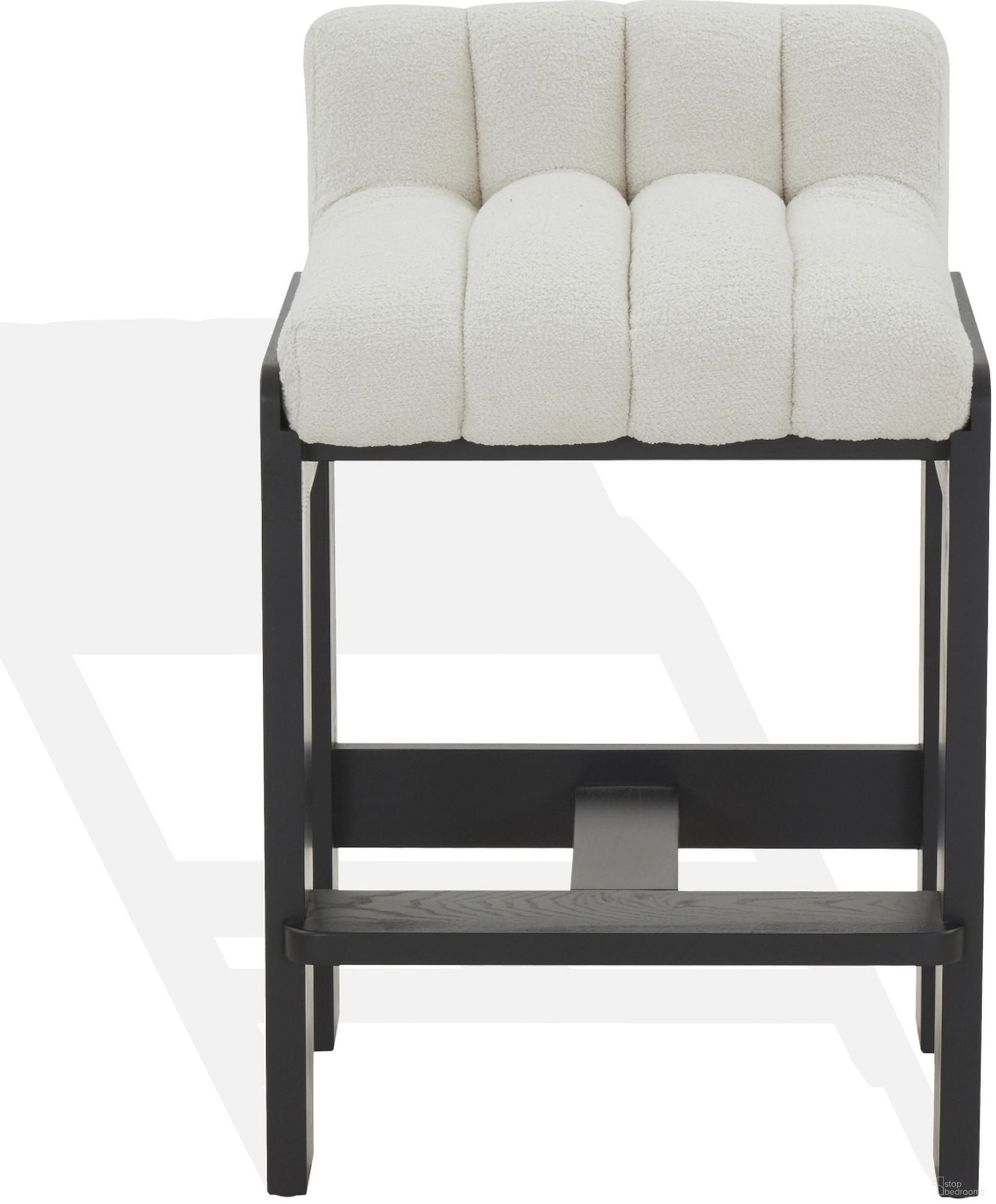 The appearance of Delphini Boucle Counter Stool In Ivory and Black designed by Safavieh Couture in the modern / contemporary interior design. This ivory and black piece of furniture was selected by 1StopBedrooms from Delphini Collection to add a touch of cosiness and style into your home. Sku: SFV4870B. Material: Wood.