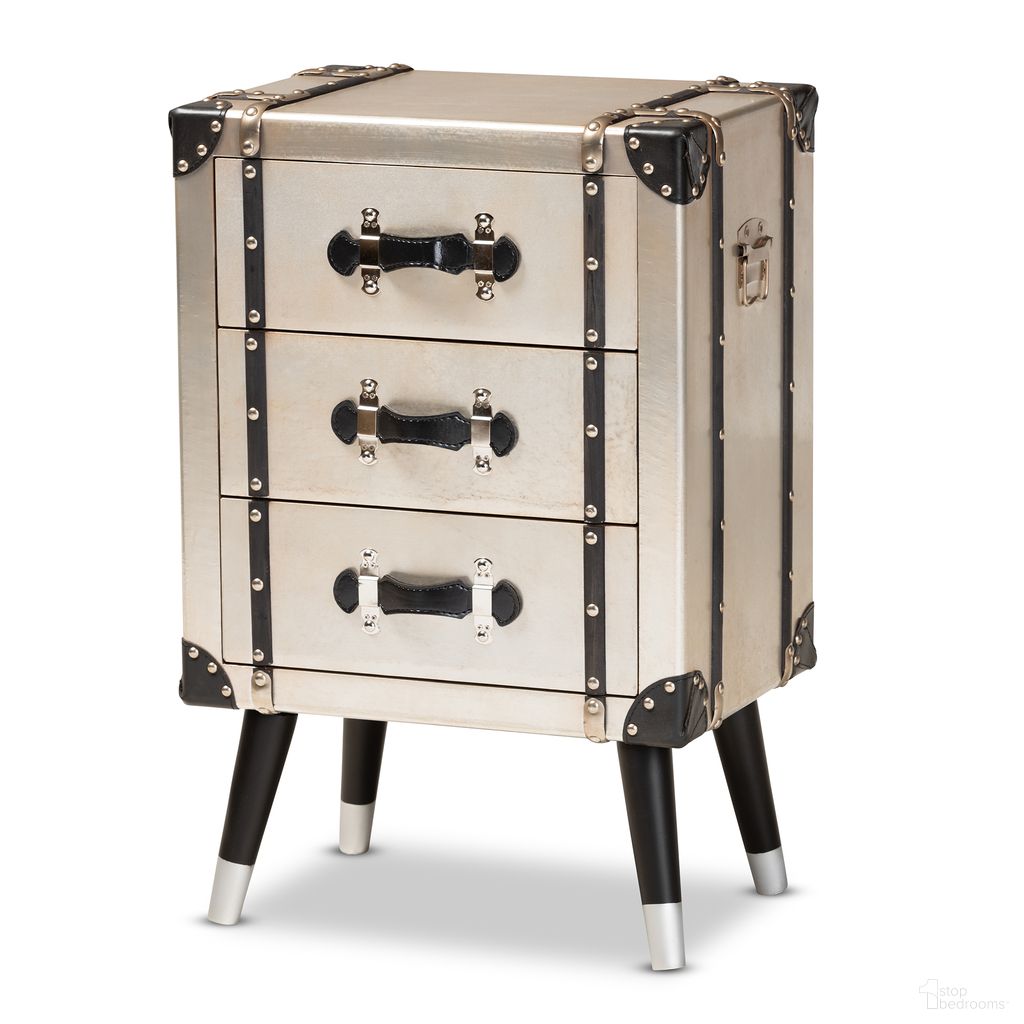 The appearance of Dilan Metal Trunk Inspired 3 Drawer End Table In Silver and Black designed by Baxton Studio in the rustic / southwestern interior design. This silver and black piece of furniture  was selected by 1StopBedrooms from Dilan Collection to add a touch of cosiness and style into your home. Sku: JY19A109-Silver-ET. Material: Aluminum.