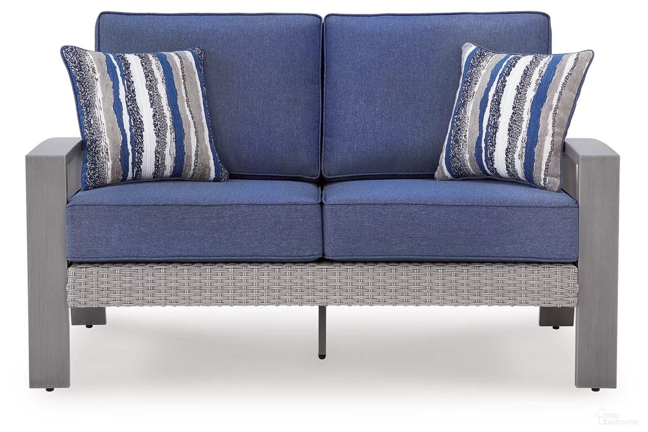 The appearance of Dillon Beach Outdoor Loveseat with Cushion In Gray and Blue designed by Signature Design by Ashley in the modern / contemporary interior design. This gray/blue piece of furniture was selected by 1StopBedrooms from Dillon Beach Collection to add a touch of cosiness and style into your home. Sku: P418-835. Material: Fabric.