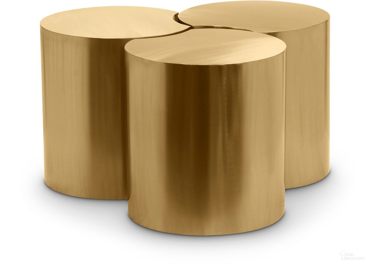The appearance of Dimple 3 Piece Coffee Table In Gold designed by Meridian in the modern / contemporary interior design. This gold piece of furniture  was selected by 1StopBedrooms from Dimple Collection to add a touch of cosiness and style into your home. Sku: 99081Gold-ET16;99081Gold-ET16;99081Gold-ET16. Material: Iron.
