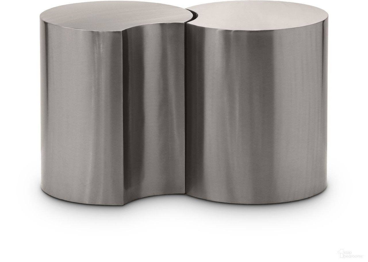 The appearance of Dimple 2 Piece End Table In Silver designed by Meridian in the modern / contemporary interior design. This silver piece of furniture  was selected by 1StopBedrooms from Dimple Collection to add a touch of cosiness and style into your home. Sku: 99081Silver-ET20;99081Silver-ET20. Material: Iron.