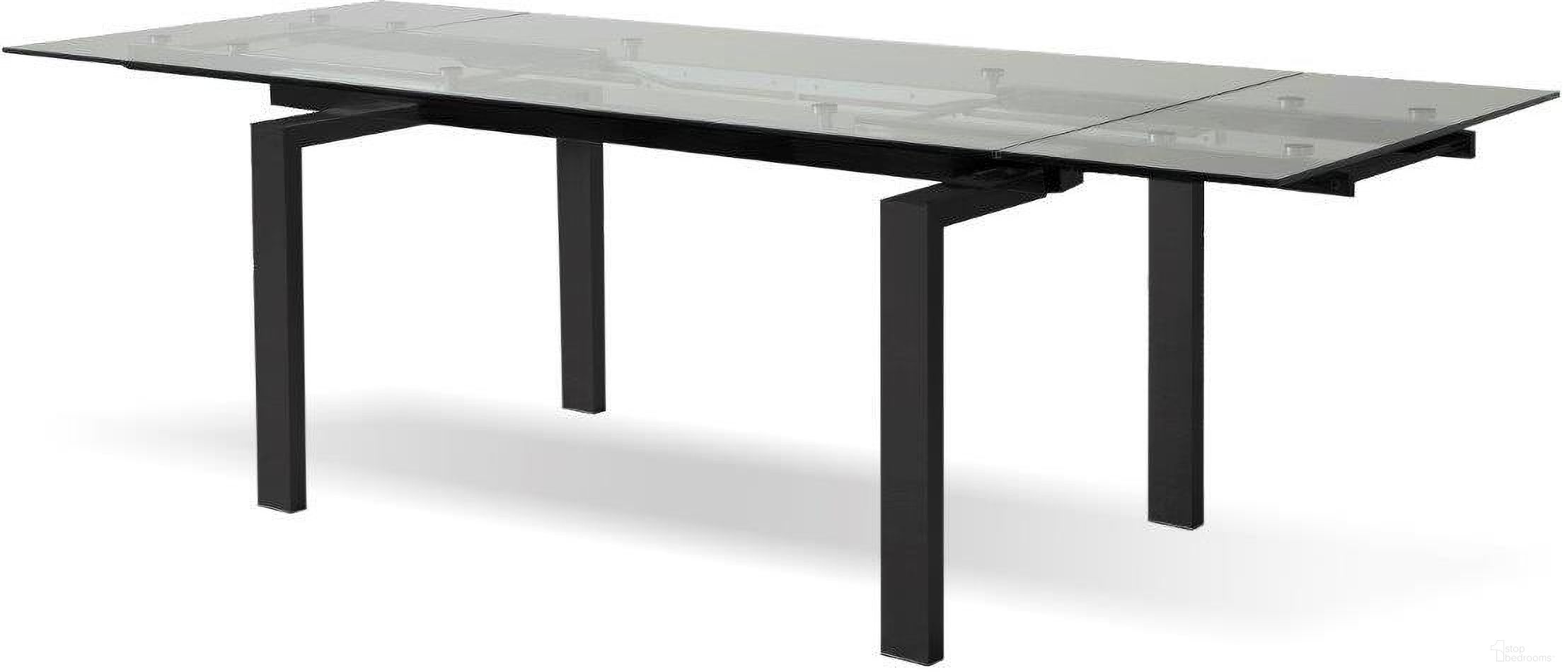 The appearance of Cantro Extension Dining Table In Black Base And Clear Tempered Glass Top designed by Mobital in the modern / contemporary interior design. This black piece of furniture  was selected by 1StopBedrooms from Cantro Collection to add a touch of cosiness and style into your home. Sku: DTA-CANT-CLEA-BLAC. Table Base Style: Legs. Material: Steel. Table Top Shape: Rectangular. Size: 35" x 63".