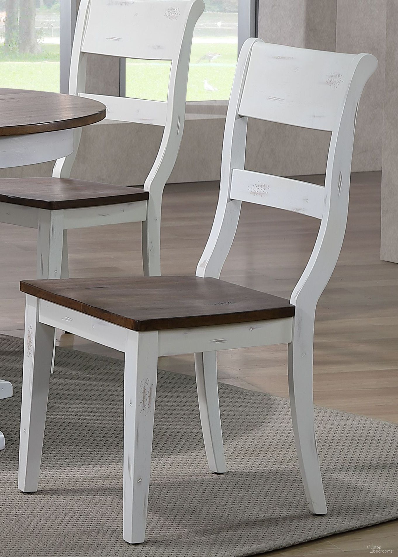 The appearance of Dining Side Chair In Distressed Cocoa Brown and Distressed Cotton White - Set of 2 designed by Iconic Furniture in the rustic / southwestern interior design. This natural brown and white piece of furniture was selected by 1StopBedrooms from Ash & Stormy White Collection to add a touch of cosiness and style into your home. Sku: CH61-DBN-DWT. Material: Rubberwood. Chair Type: Side Chair.