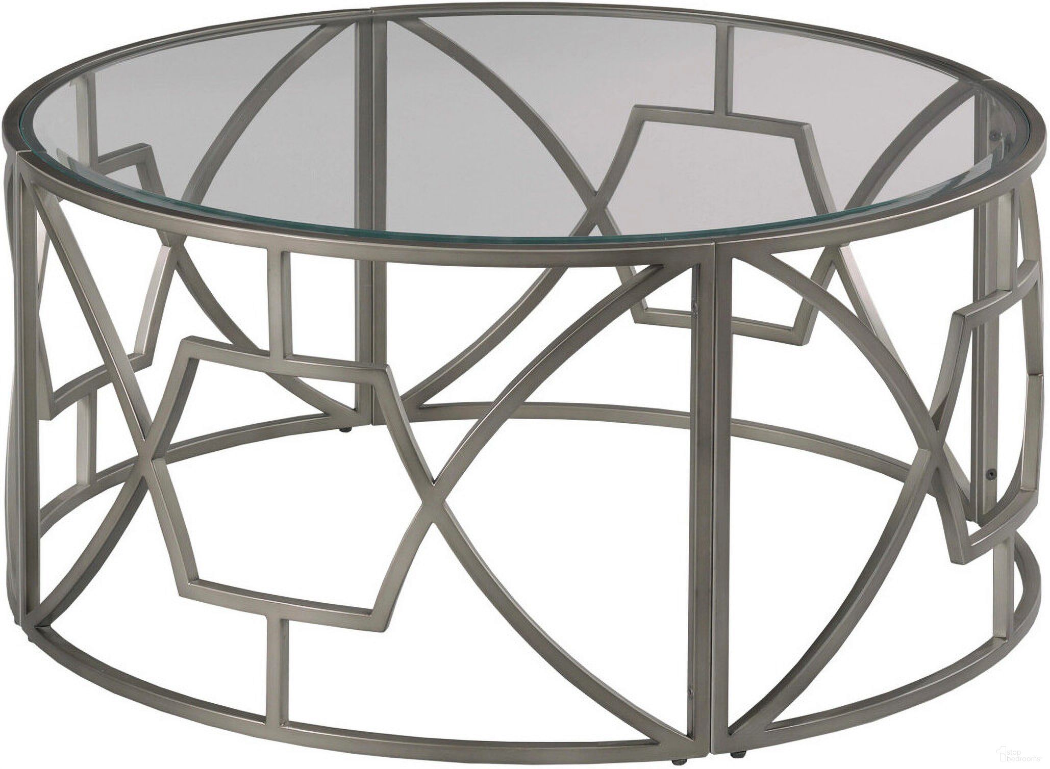 The appearance of Domaine Round Coffee Table In Taupe designed by Hammary in the modern / contemporary interior design. This taupe piece of furniture was selected by 1StopBedrooms from Domaine Collection to add a touch of cosiness and style into your home. Sku: 181-911. Material: Wood.