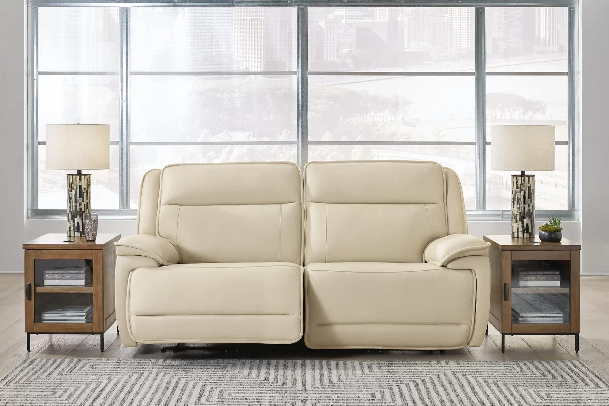 The appearance of Double Deal 2-Piece Power Reclining Loveseat Sectional In Almond designed by Signature Design by Ashley in the modern / contemporary interior design. This almond piece of furniture was selected by 1StopBedrooms from Double Deal Collection to add a touch of cosiness and style into your home. Sku: U1300158;U1300162. Material: Genuine Leather.