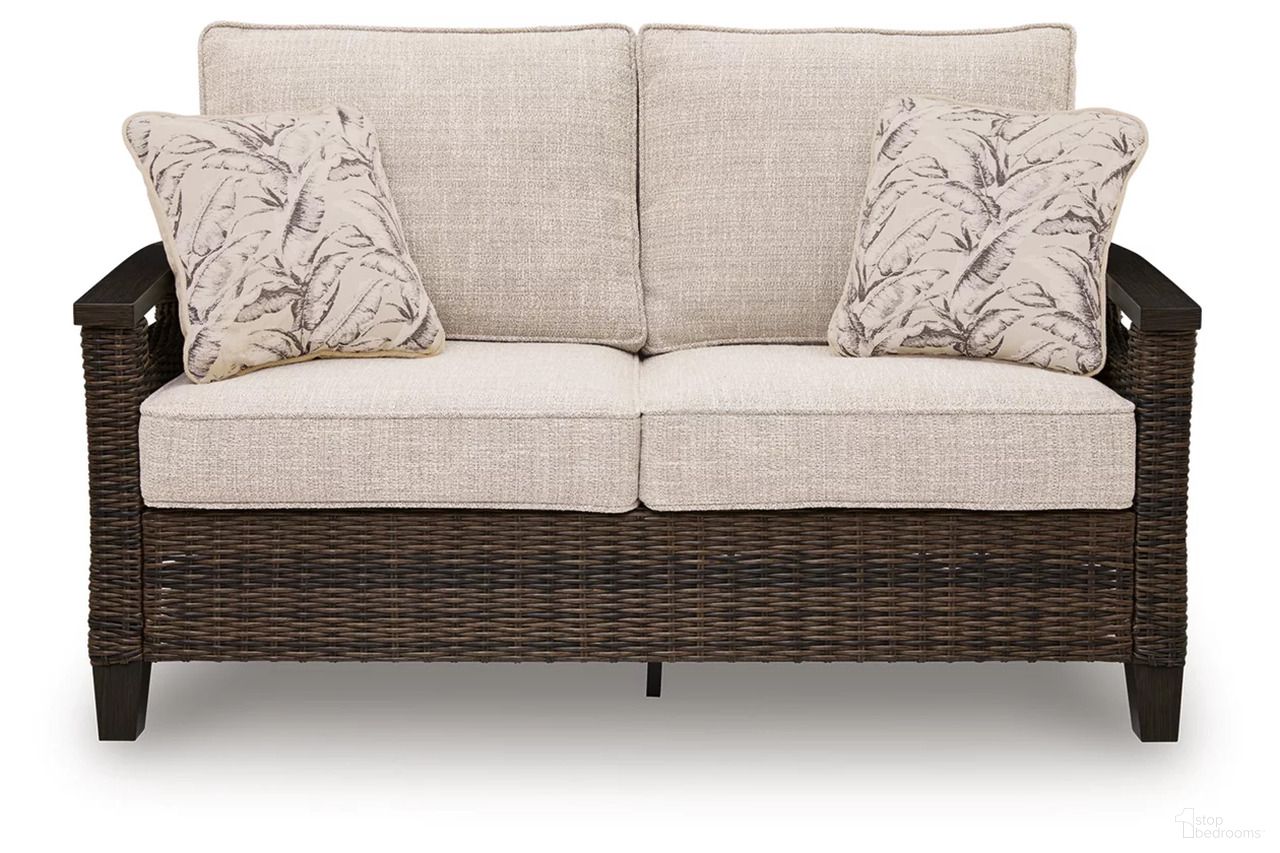 The appearance of Drakes Beach Outdoor Loveseat with Cushion In Dark Brown designed by Signature Design by Ashley in the transitional interior design. This dark brown piece of furniture was selected by 1StopBedrooms from Drakes Beach Collection to add a touch of cosiness and style into your home. Sku: P760-835. Material: Fabric.