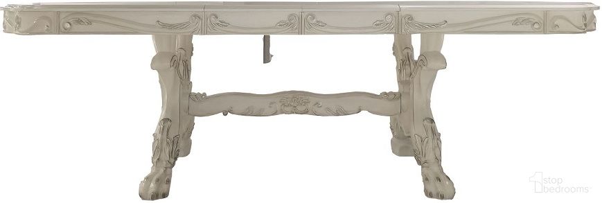 The appearance of Dresden Dining Table with 21 Inch Leaf In Bone White designed by ACME in the transitional interior design. This bone white piece of furniture was selected by 1StopBedrooms from Dresden Collection to add a touch of cosiness and style into your home. Sku: DN01695-1;DN01695-2. Table Base Style: Trestle. Material: Wood. Table Top Shape: Rectangular. Size: 46" x 136".