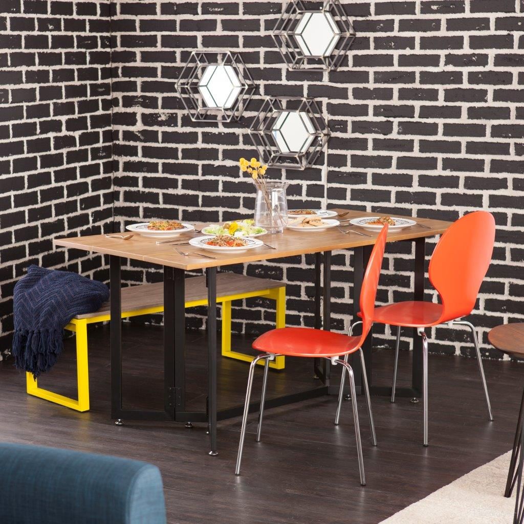 The appearance of Driness Drop Leaf Table In Oak With Black designed by SEI Furniture in the modern / contemporary interior design. This oak piece of furniture  was selected by 1StopBedrooms from Driness Collection to add a touch of cosiness and style into your home. Sku: DN7448. Material: MDF. Size: 32" x 63".
