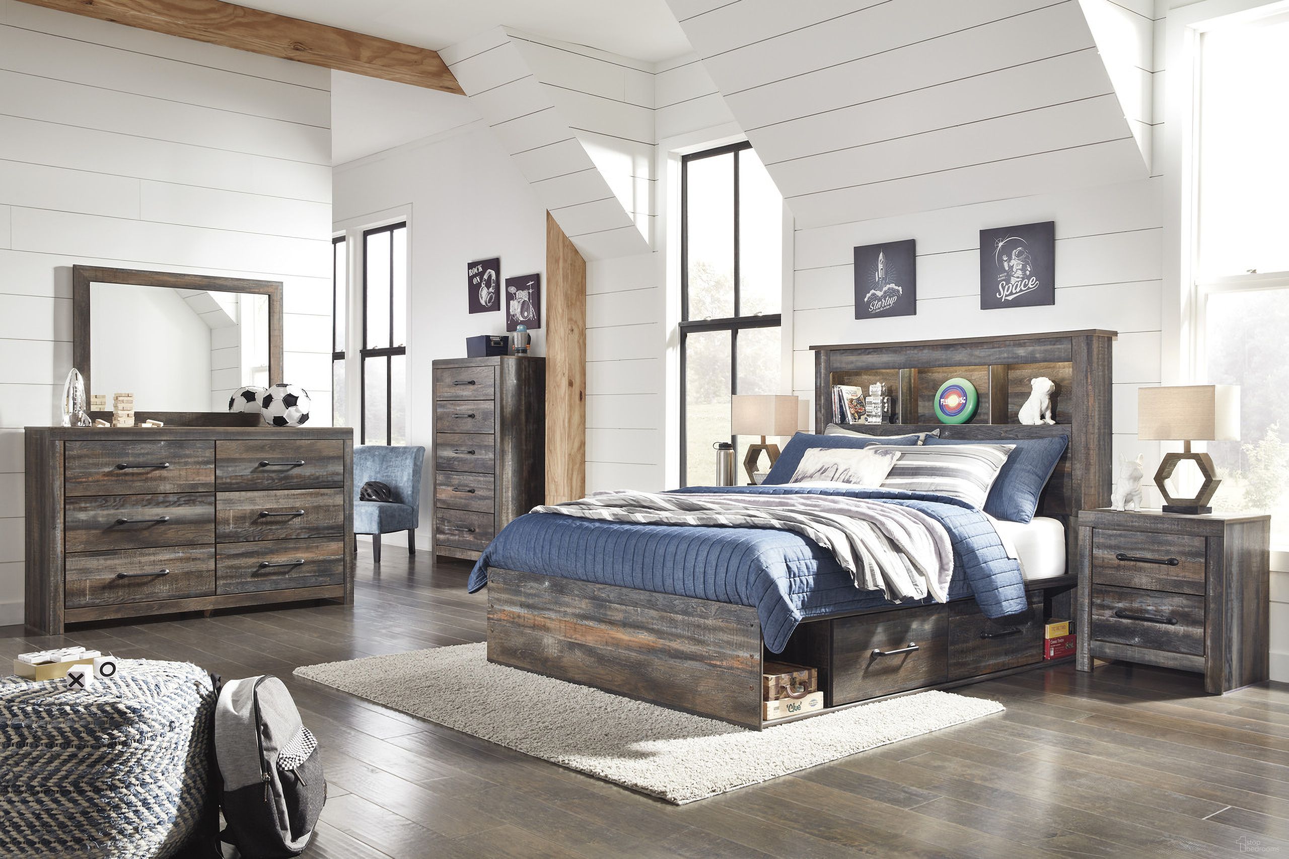 The appearance of Drystan Multi Youth Bookcase Panel Bedroom Set with Double Underbed Storage designed by Signature Design by Ashley in the transitional interior design. This multi piece of furniture was selected by 1StopBedrooms from Drystan Collection to add a touch of cosiness and style into your home. Sku: B211-85;B211-84;B211-50;B211-50;B100-12;B211-92. Bed Type: Panel Bed. Material: Wood. Bed Size: Full.