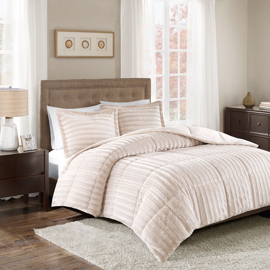 The appearance of Duke Faux Fur 3 Piece Comforter Mini Set In Champagne designed by Olliix in the glam interior design. This champagne piece of furniture was selected by 1StopBedrooms from Duke Collection to add a touch of cosiness and style into your home. Sku: MP10-3067. Material: Polyester. Bed Size: King.