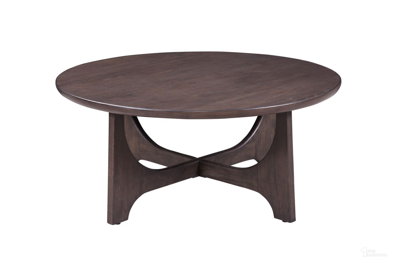 The appearance of Dunnigan Round Cocktail Table In Antique Brown Oak designed by Bassett Mirror Company in the modern / contemporary interior design. This antique brown piece of furniture  was selected by 1StopBedrooms from Dunnigan Collection to add a touch of cosiness and style into your home. Sku: 7099-LR-120. Material: Wood.