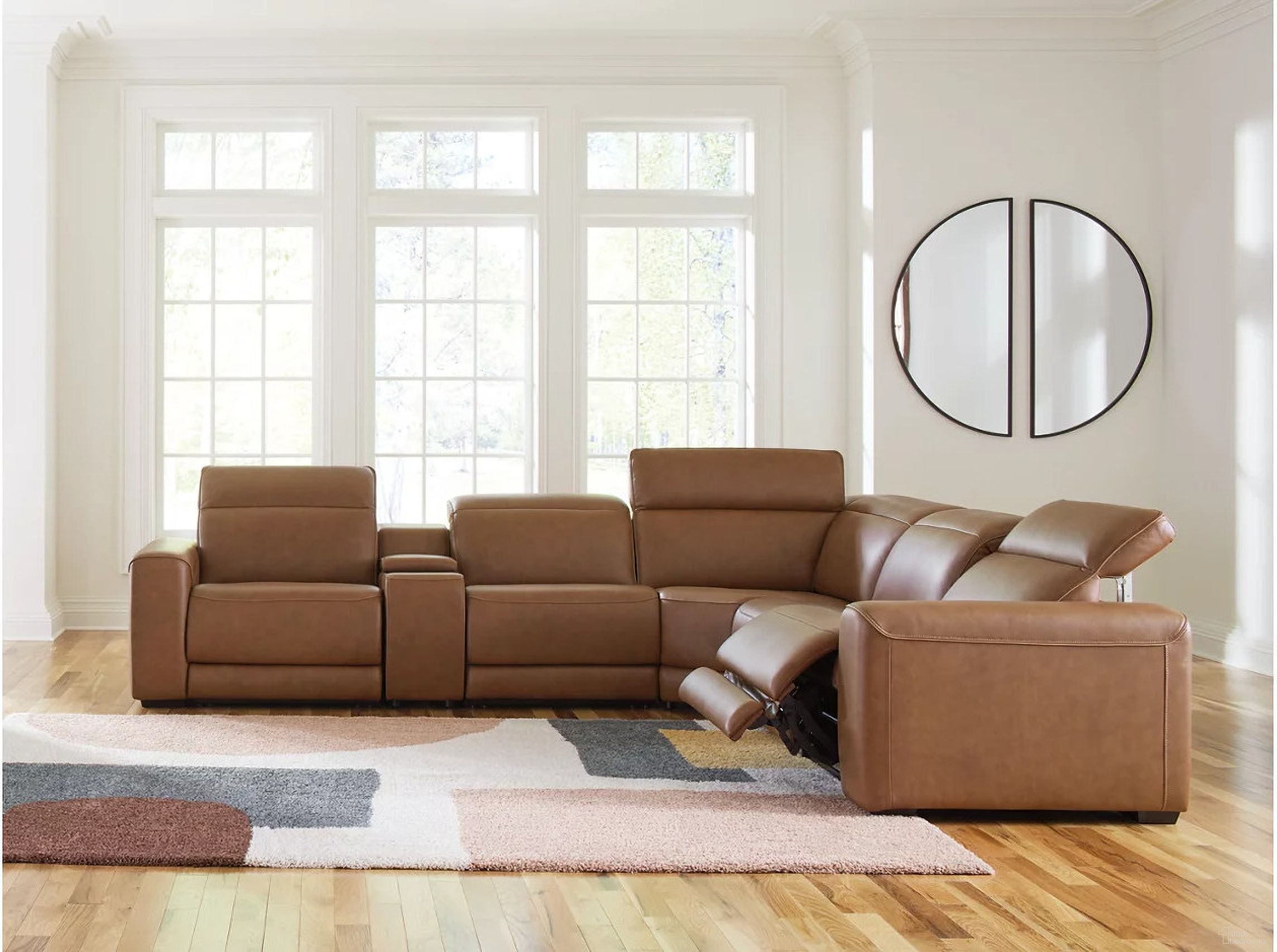 The appearance of EasyMoney 6-Piece Power Reclining Sectional with Console In Caramel designed by Signature Design by Ashley in the modern / contemporary interior design. This caramel piece of furniture  was selected by 1StopBedrooms from EasyMoney Collection to add a touch of cosiness and style into your home. Sku: NCU1070058;NCU1070031;NCU1070046A;NCU1070057;NCU1070077;NCU1070062. Material: Leather. Layout: L-Shape.