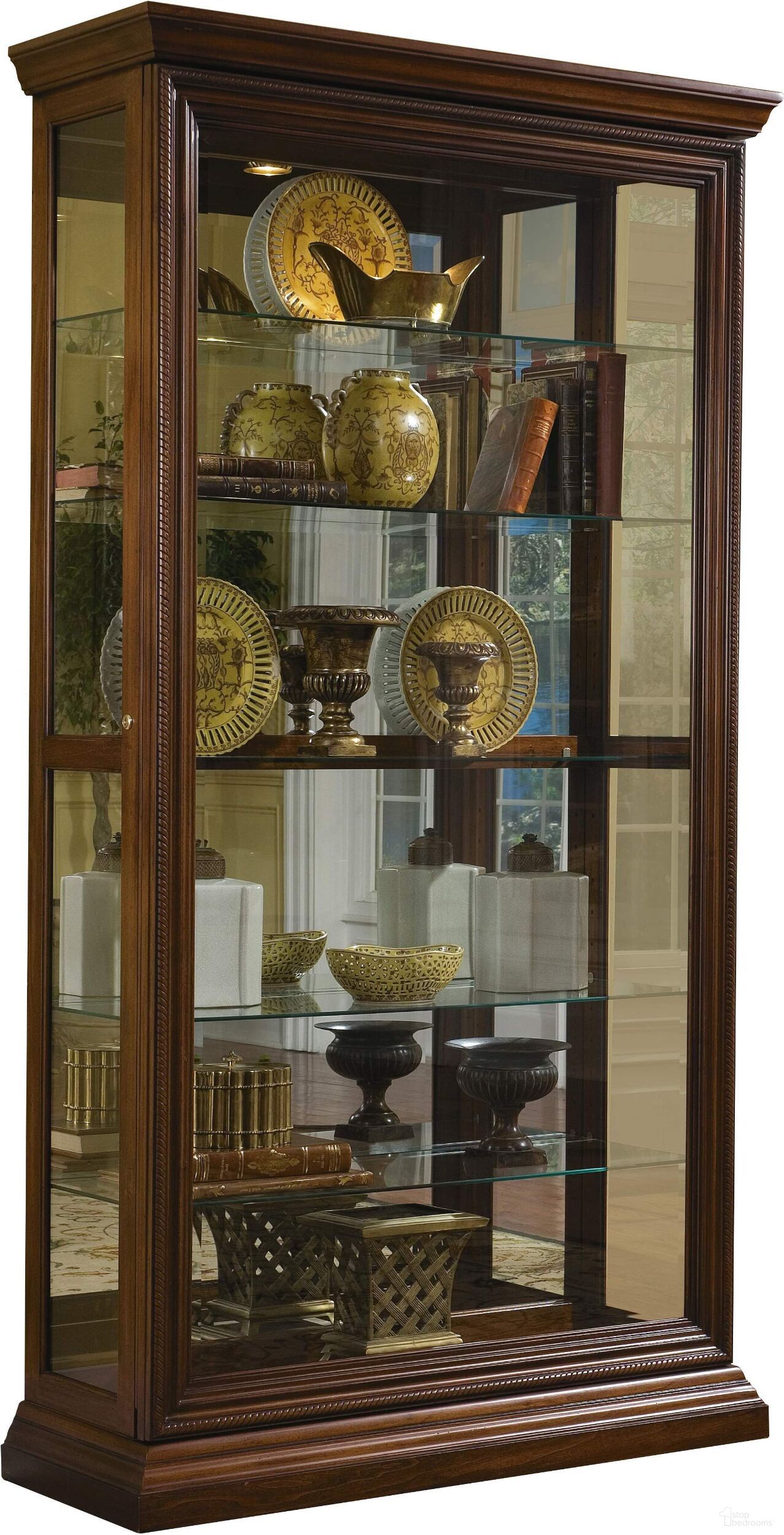The appearance of Edwardian 5 Shelf Sliding Door Curio Cabinet In Oak Brown designed by Pulaski in the traditional interior design. This brown piece of furniture was selected by 1StopBedrooms from Curios Collection to add a touch of cosiness and style into your home. Sku: 21015. Material: Wood.
