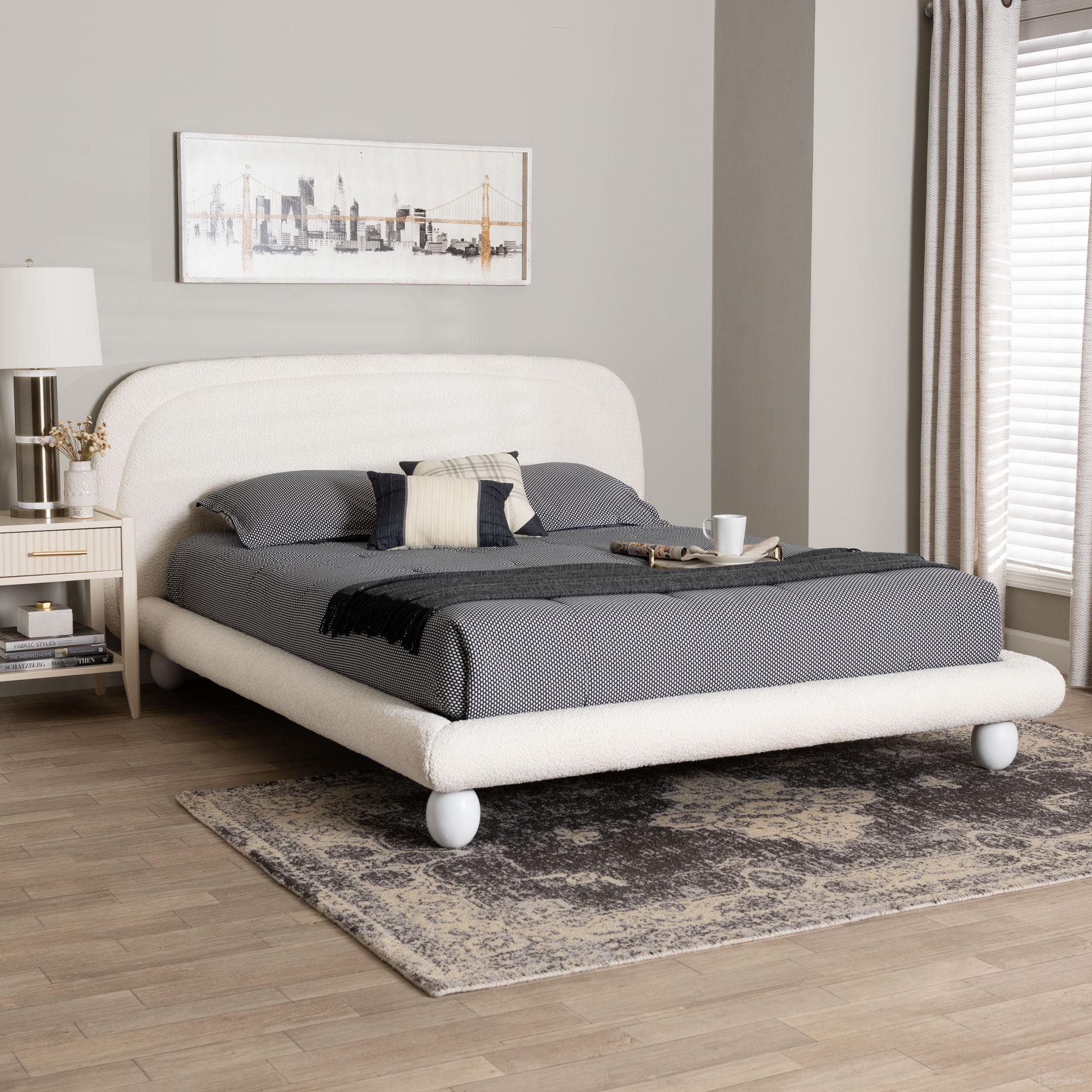 The appearance of Eladio Boucle Fabric Queen Bed In Ivory designed by Baxton Studio in the modern / contemporary interior design. This ivory piece of furniture was selected by 1StopBedrooms from Eladio Collection to add a touch of cosiness and style into your home. Sku: BBT61186.11-White-Queen. Bed Type: Platform Bed. Bed Size: Queen. Material: Rubberwood.