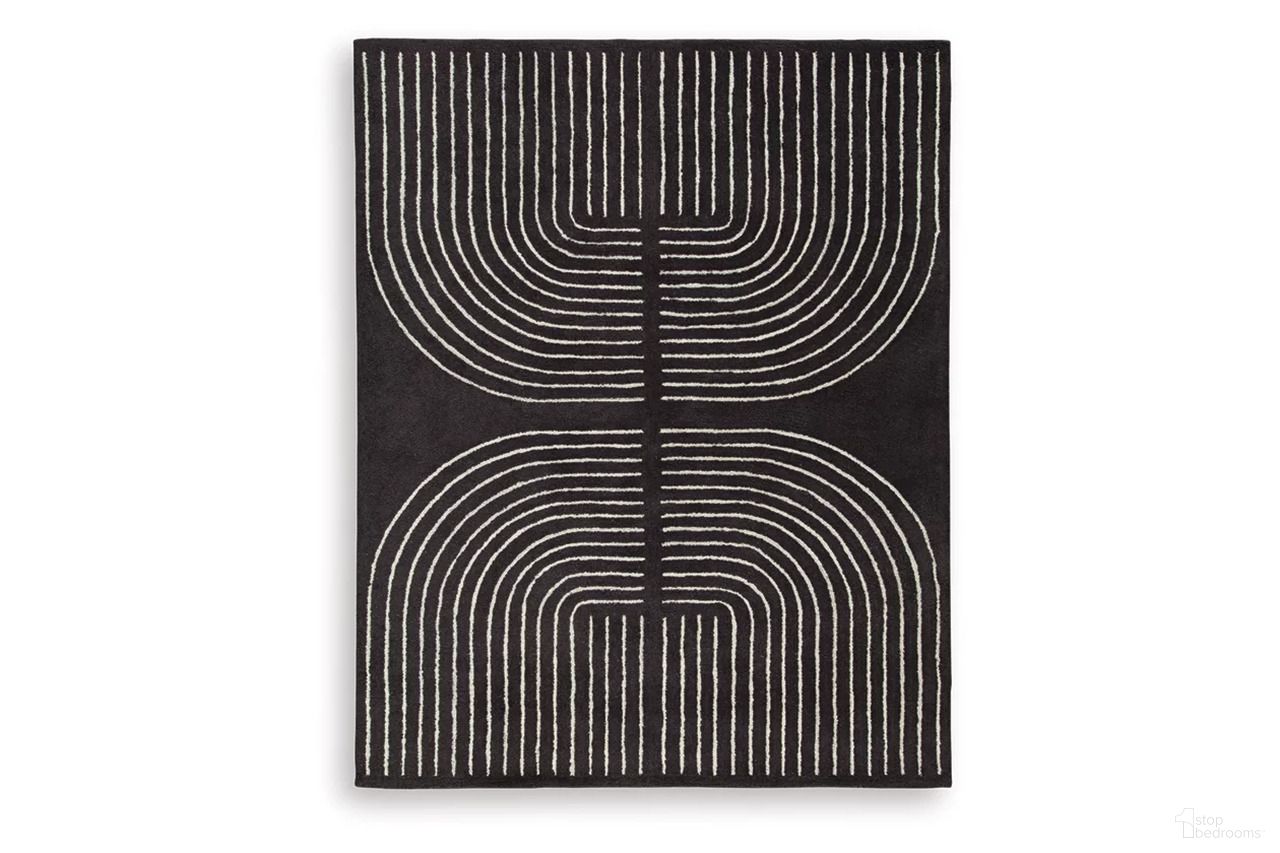 The appearance of Eldonmore 7'8" x 10' Area Rug In Black and Ivory designed by Signature Design by Ashley in the modern / contemporary interior design. This black/ivory piece of furniture was selected by 1StopBedrooms from Eldonmore Collection to add a touch of cosiness and style into your home. Sku: R407571.