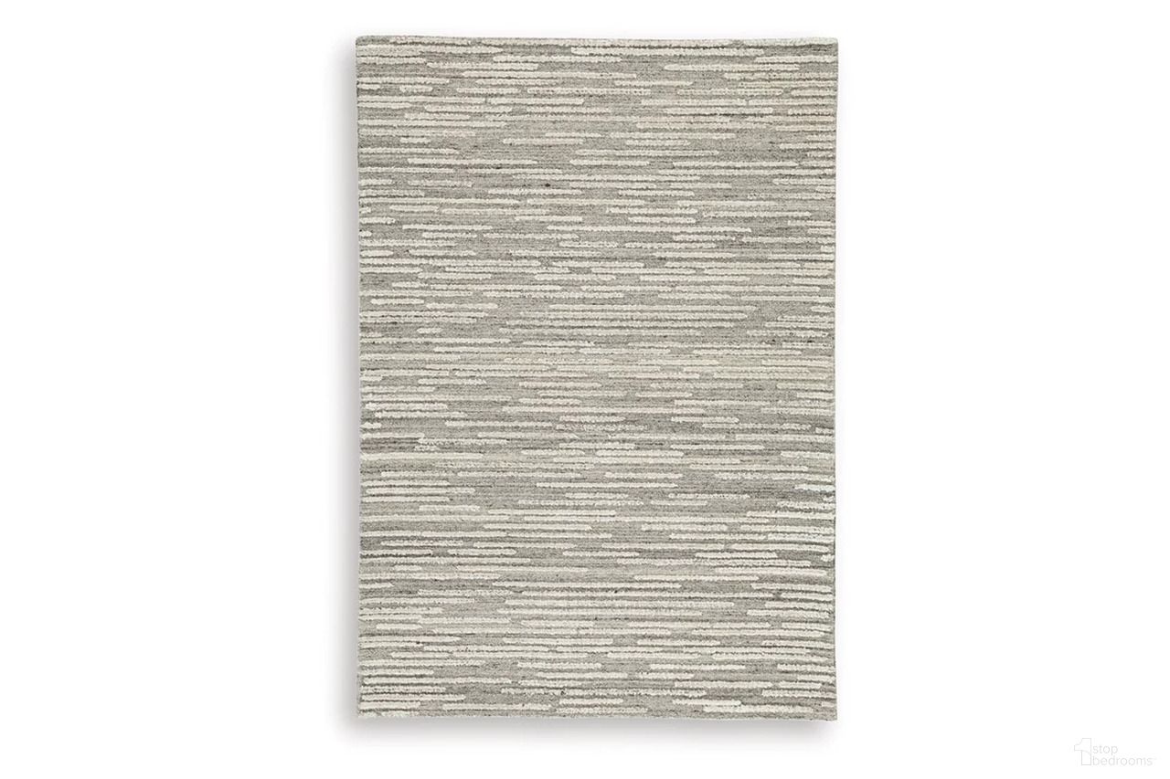 Eljory Medium Rug In Gray