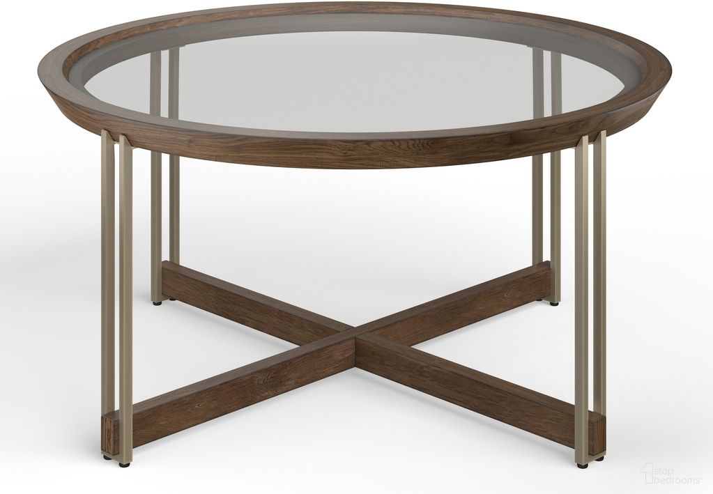 The appearance of Elora Round Cocktail Table designed by Magnussen in the transitional interior design. This walnut piece of furniture  was selected by 1StopBedrooms from Elora Collection to add a touch of cosiness and style into your home. Sku: T5639-45. Material: Rubberwood.