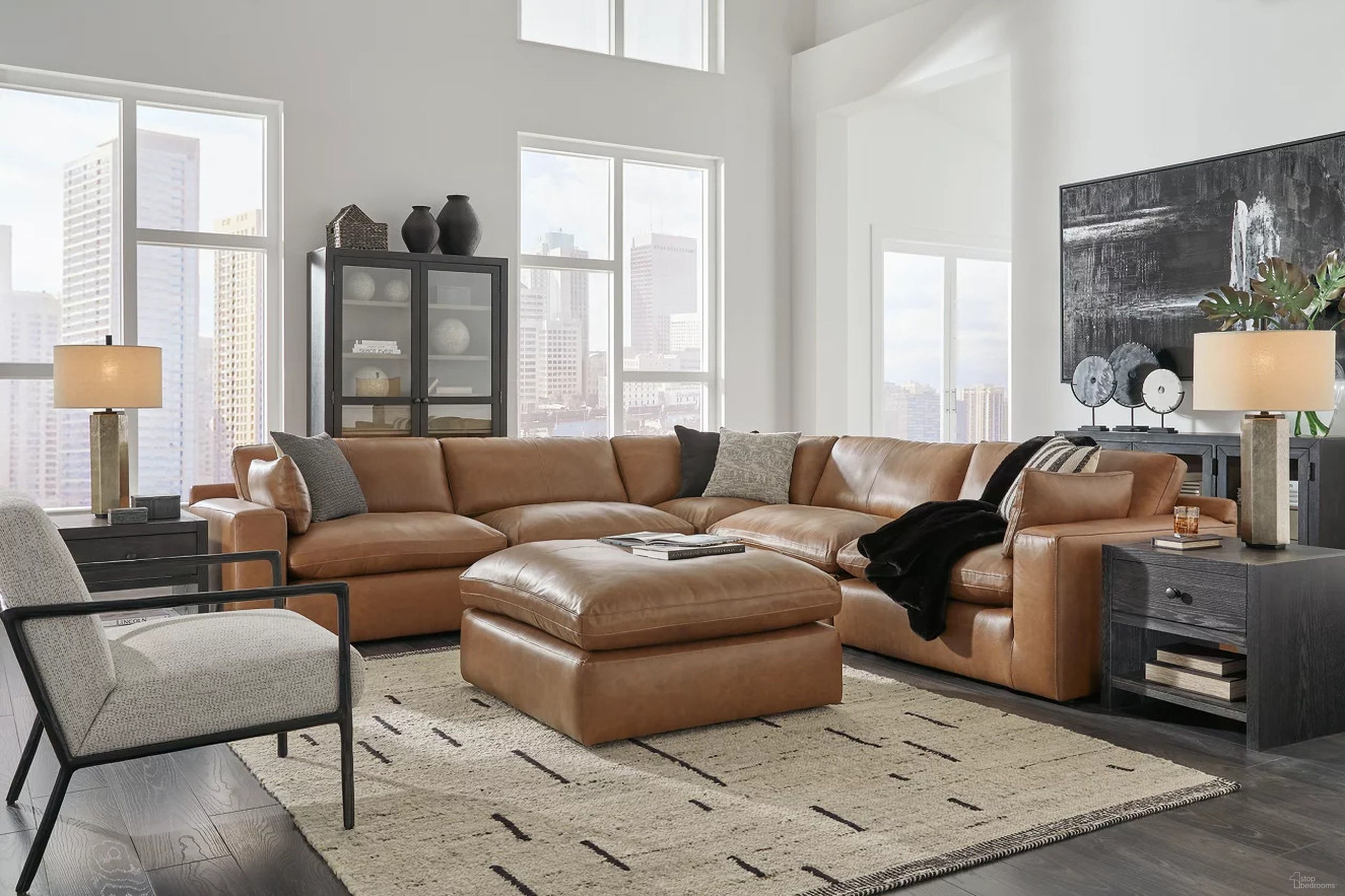 The appearance of Emilia 5-Piece Sectional and Ottoman In Caramel designed by Signature Design by Ashley in the modern / contemporary interior design. This caramel piece of furniture was selected by 1StopBedrooms from Emilia Collection to add a touch of cosiness and style into your home. Sku: 3090164;3090108;3090146;3090146;3090177;3090165. Material: Leather. Layout: L-Shape.