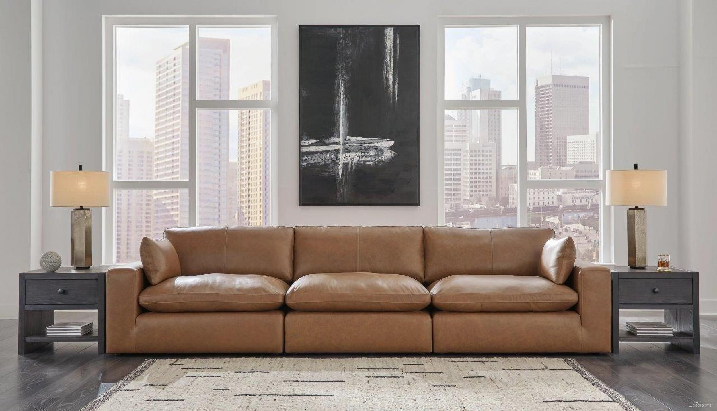 The appearance of Emilia Sofa In Caramel designed by Signature Design by Ashley in the modern / contemporary interior design. This caramel piece of furniture was selected by 1StopBedrooms from Emilia Collection to add a touch of cosiness and style into your home. Sku: 3090146;3090164;3090165. Material: Leather Match.