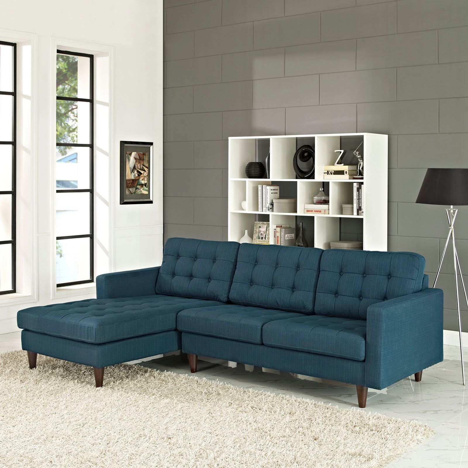 The appearance of Empress Azure Left-Facing Upholstered Fabric Sectional Sofa designed by Modway in the modern / contemporary interior design. This azure piece of furniture was selected by 1StopBedrooms from Empress Collection to add a touch of cosiness and style into your home. Sku: EEI-2595-AZU;EEI-2596-AZU. Material: Polyester. Layout: Sofa & Chaise. Orientation: LAF.