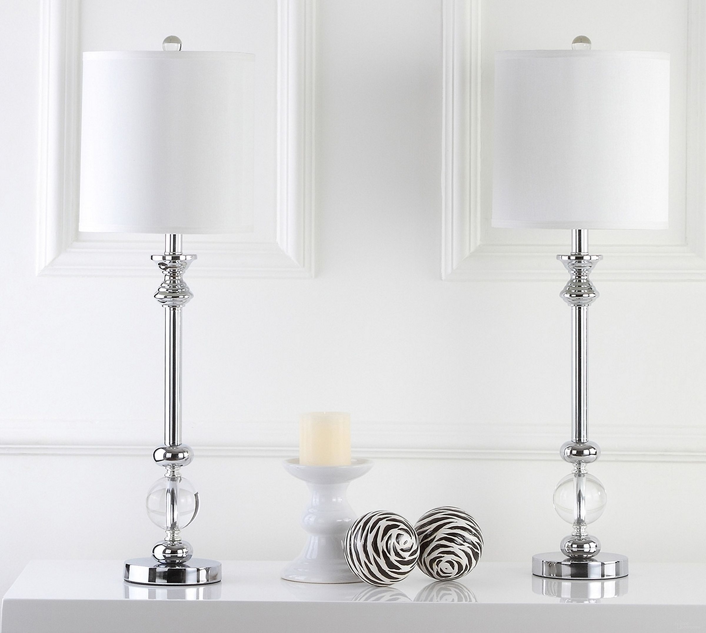 The appearance of Erica White 31 Inch Crystal Candlestick Lamp Set of 2 designed by Safavieh in the modern / contemporary interior design. This clear piece of furniture  was selected by 1StopBedrooms from Safavieh LIT Collection to add a touch of cosiness and style into your home. Sku: LIT4164A-SET2. Material: Chrome.