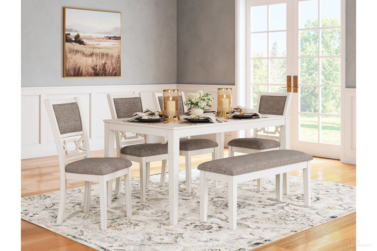 The appearance of Erinberg Dining Table and 4 Chairs and Bench Set of 6 In Antique White designed by Signature Design by Ashley in the transitional interior design. This antique white piece of furniture was selected by 1StopBedrooms from Erinberg Collection to add a touch of cosiness and style into your home. Sku: D423-325. Material: Fabric.