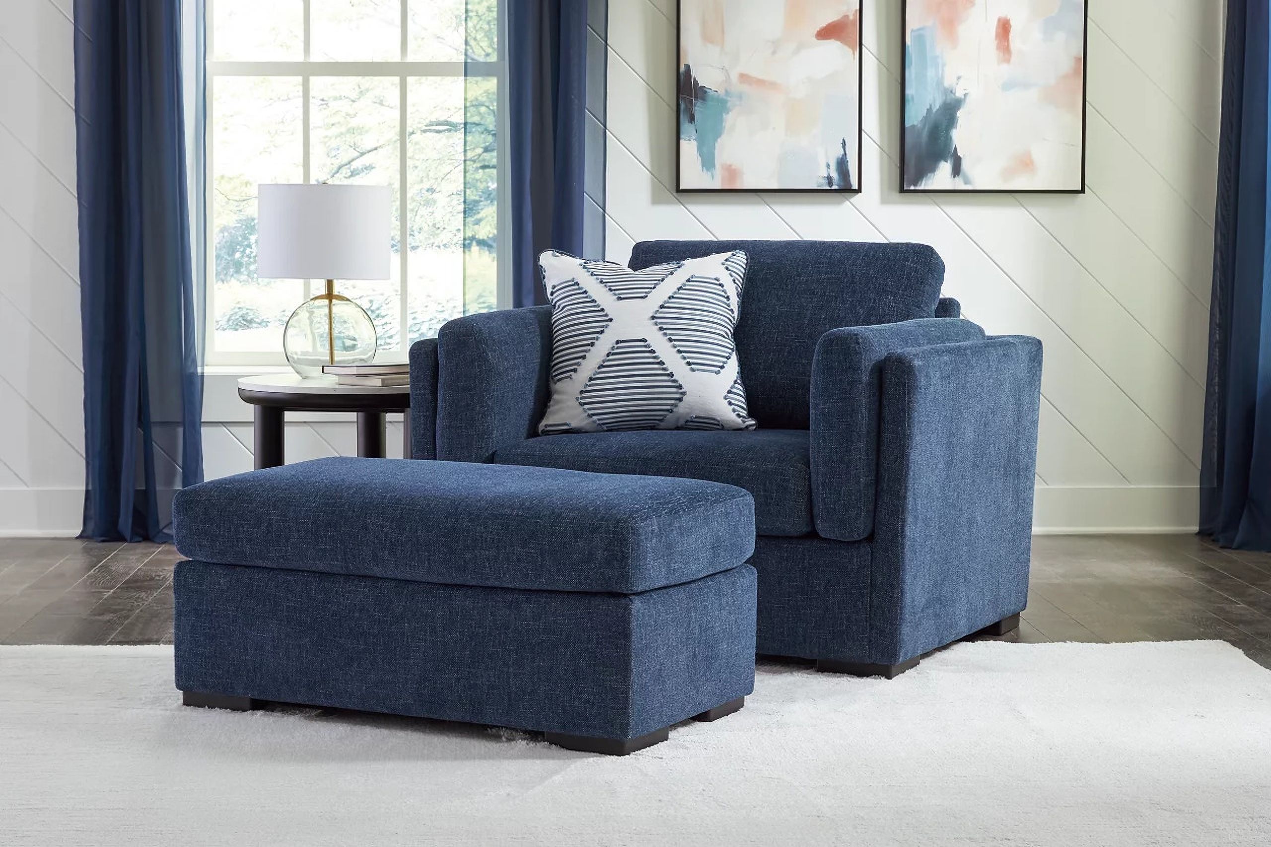 The appearance of Evansley Oversized Chair and Ottoman In Navy designed by Signature Design by Ashley in the modern / contemporary interior design. This navy piece of furniture was selected by 1StopBedrooms from Evansley Collection to add a touch of cosiness and style into your home. Sku: 5450223;5450214. Material: Fabric.