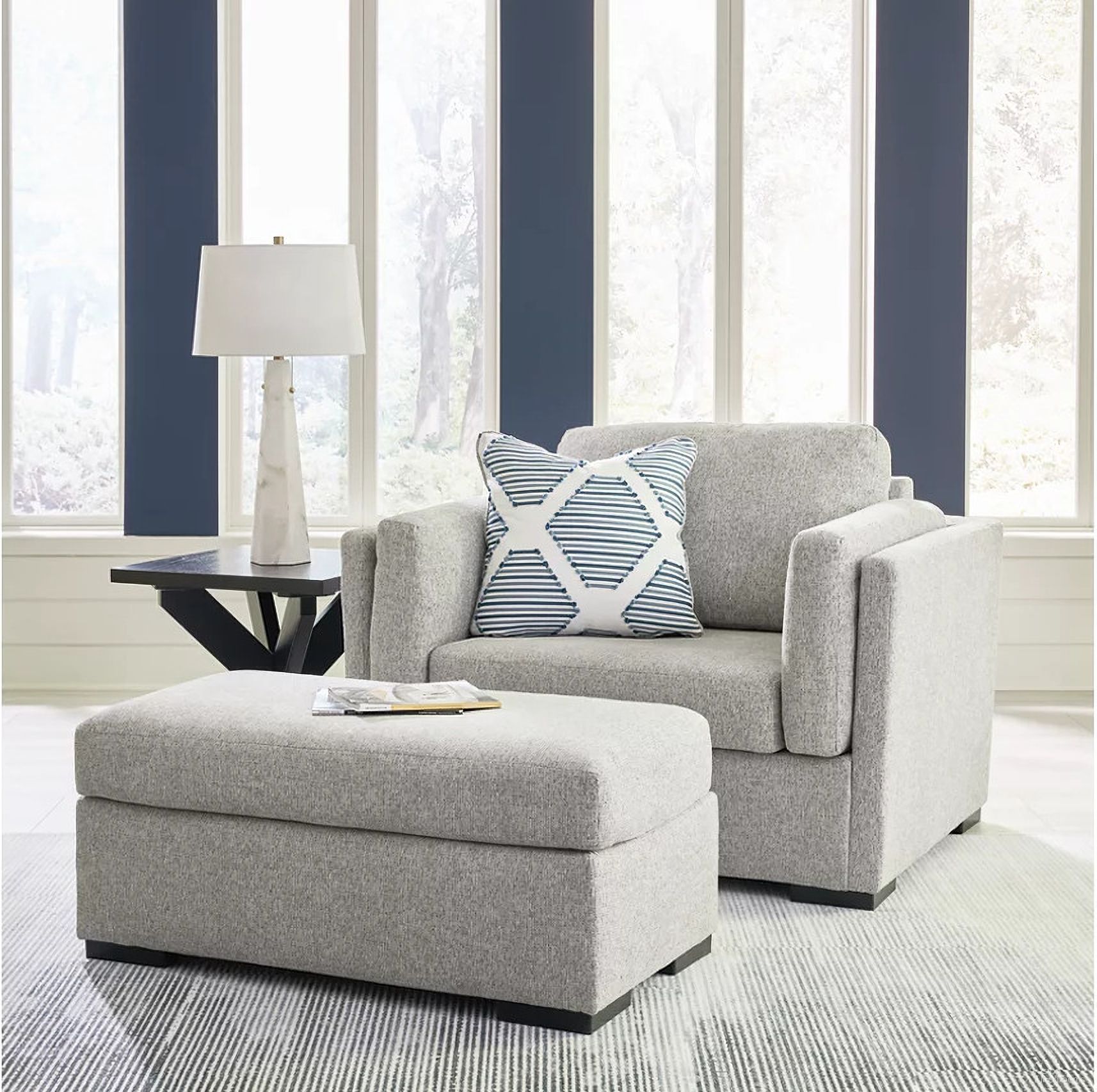 The appearance of Evansley Oversized Chair and Ottoman designed by Signature Design by Ashley in the modern / contemporary interior design. This pewter piece of furniture  was selected by 1StopBedrooms from Evansley Collection to add a touch of cosiness and style into your home. Sku: 5450314;5450323. Material: Wood.