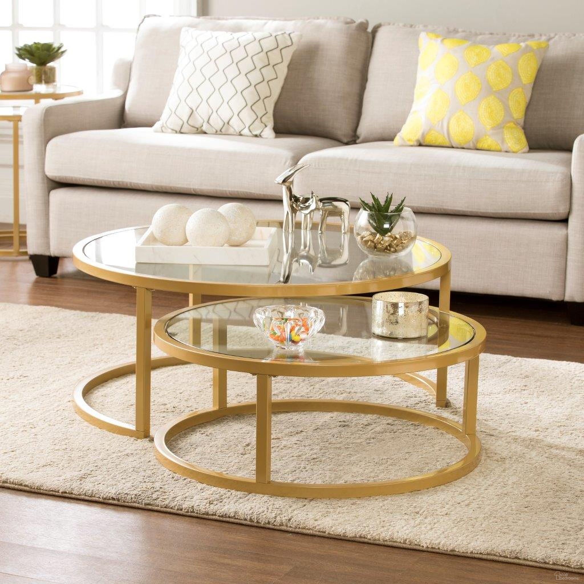 The appearance of Evelyn Glam Nesting Cocktail Table Set of 2 In Gold designed by SEI Furniture in the transitional interior design. This gold piece of furniture  was selected by 1StopBedrooms from Evelyn Collection to add a touch of cosiness and style into your home. Sku: CK4290. Material: Glass.