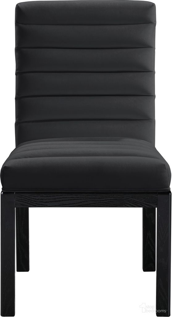 The appearance of Evelyn Velvet Dining Chair In Black designed by Meridian in the modern / contemporary interior design. This black piece of furniture  was selected by 1StopBedrooms from Evelyn Collection to add a touch of cosiness and style into your home. Sku: 902Black-C. Material: Velvet. Chair Type: Side Chair.