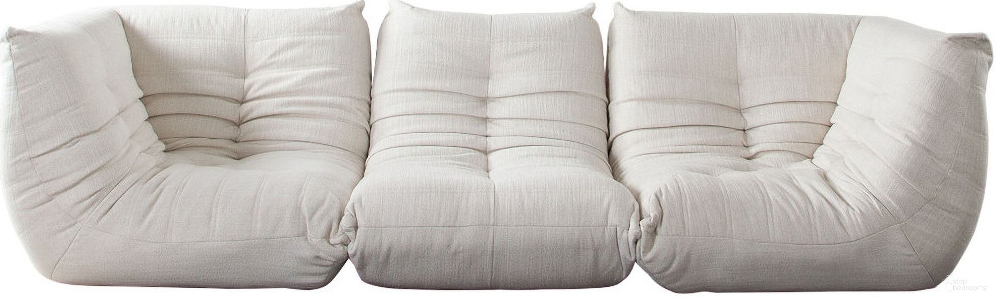 The appearance of Ezra 3PC Modular Sofa In Cream Fabric designed by Diamond Sofa in the modern / contemporary interior design. This cream piece of furniture was selected by 1StopBedrooms from Ezra Collection to add a touch of cosiness and style into your home. Sku: EZRASCCM;EZRAACCM;EZRASCCM. Material: Fabric.