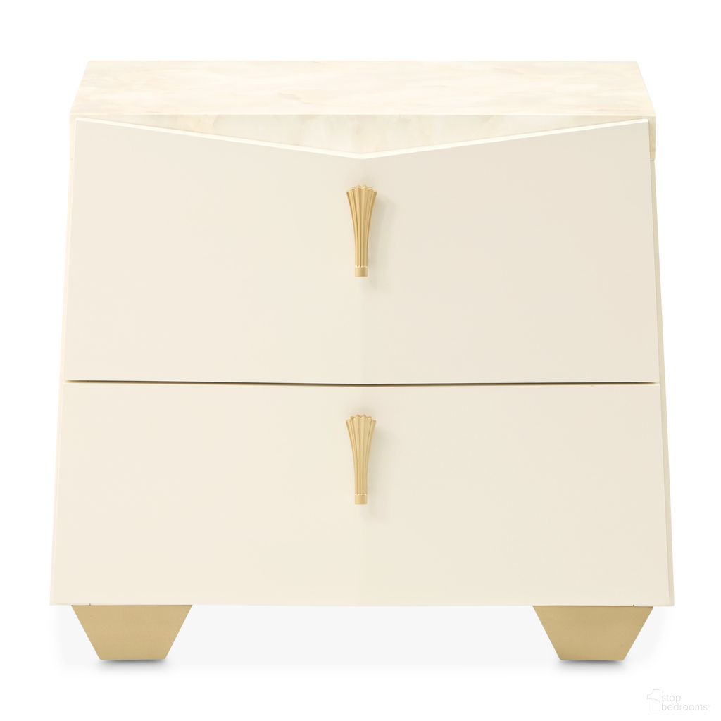 The appearance of Fantosini Nightstand In Creamy Pearl designed by Michael Amini in the modern / contemporary interior design. This creamy pearl piece of furniture was selected by 1StopBedrooms from Fantosini Collection to add a touch of cosiness and style into your home. Sku: 9091040-112. Material: Solid Wood.