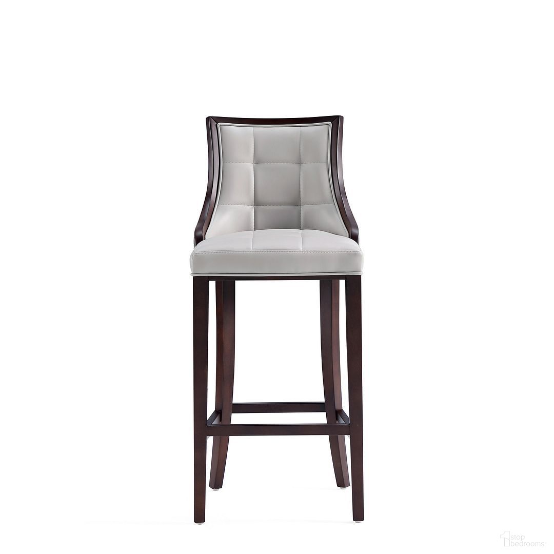 The appearance of Fifth Avenue Faux Leather Barstool In Light Grey designed by Manhattan Comfort in the traditional interior design. This light grey piece of furniture  was selected by 1StopBedrooms from Fifth Avenue Collection to add a touch of cosiness and style into your home. Sku: BS007-LG. Material: Wood.