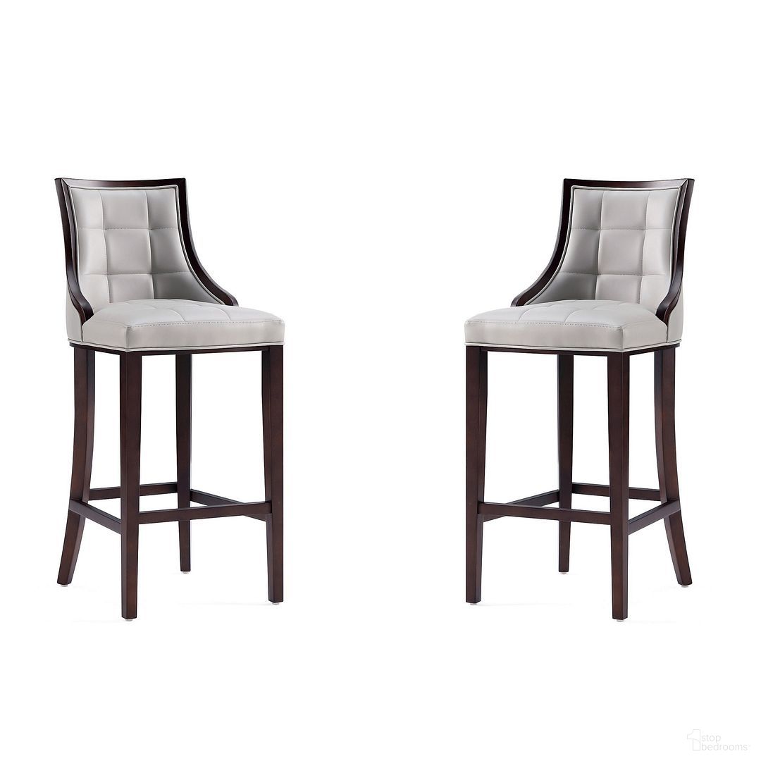 The appearance of Fifth Avenue Faux Leather Barstool Set of 2 In Light Grey designed by Manhattan Comfort in the traditional interior design. This light grey piece of furniture was selected by 1StopBedrooms from Fifth Avenue Collection to add a touch of cosiness and style into your home. Sku: BS007-LG;BS007-LG. Material: Wood.
