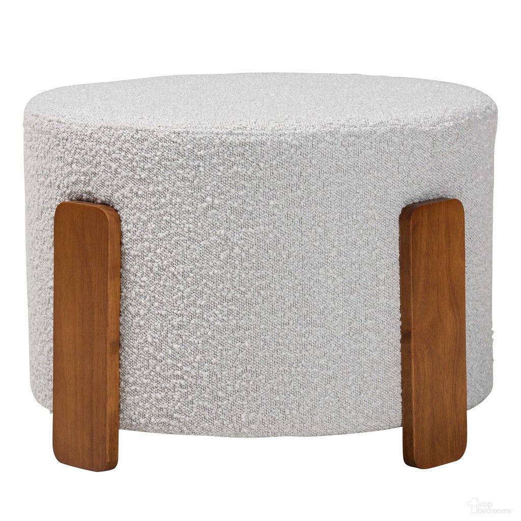 The appearance of Finlay Boucle Fabric and Wood Ottoman Footstool In Light Grey and Walnut Brown designed by Baxton Studio in the transitional interior design. This light grey and walnut piece of furniture  was selected by 1StopBedrooms from Finlay Collection to add a touch of cosiness and style into your home. Sku: BBT5487-Walnut/Maya Sky Grey-Stool. Material: Plywood.