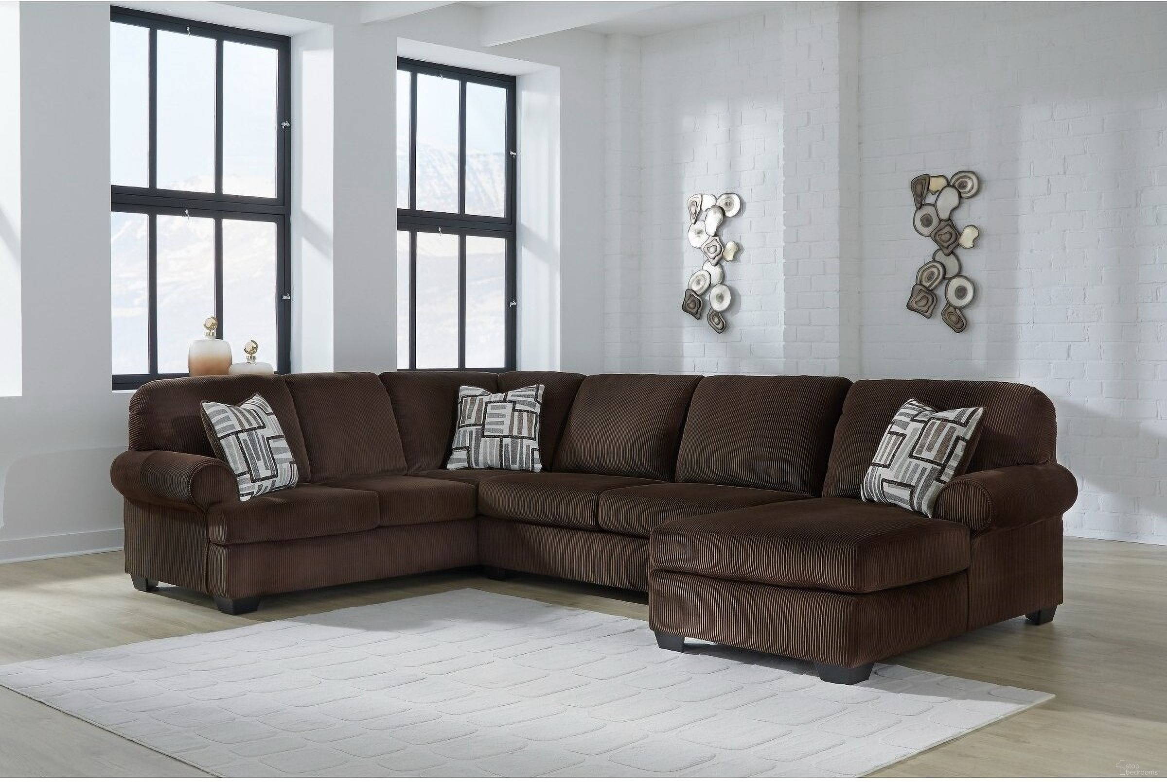 The appearance of Firescrest 3-Piece RAF Sectional With Chaise In Chocolate designed by Signature Design by Ashley in the modern / contemporary interior design. This chocolate piece of furniture  was selected by 1StopBedrooms from Firescrest Collection to add a touch of cosiness and style into your home. Sku: NC3560366;NC3560334;NC3560317. Material: Polyester. Layout: Sofa & Chaise. Orientation: RAF.