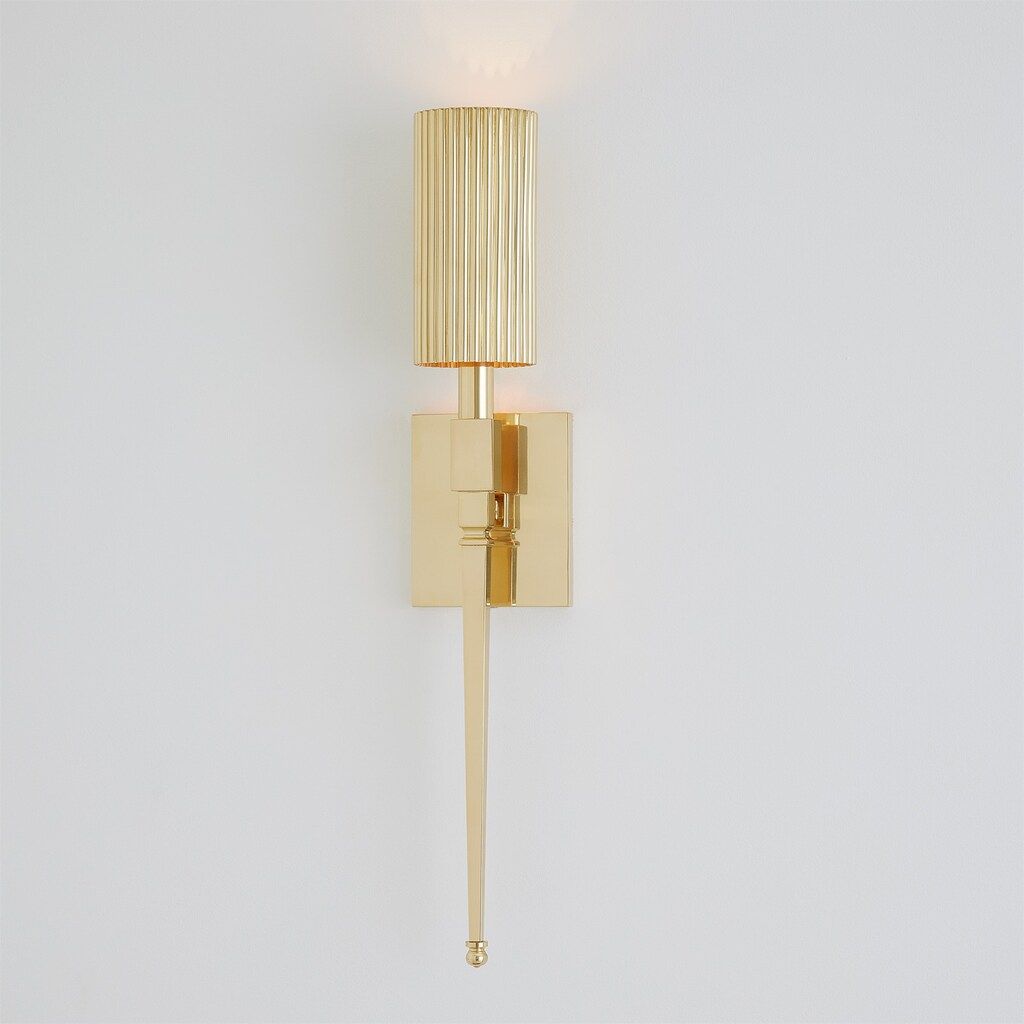 The appearance of Fluted Single Sconce In Brass designed by Global Views in the modern / contemporary interior design. This brass piece of furniture  was selected by 1StopBedrooms from Fluted Collection to add a touch of cosiness and style into your home. Sku: 993909. Material: Brass.