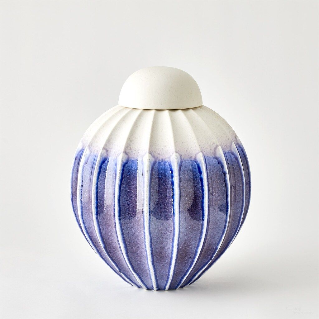 The appearance of Fluted Wide Jar with Lid In Cobalt designed by Global Views in the modern / contemporary interior design. This cobalt piece of furniture  was selected by 1StopBedrooms from Fluted Collection to add a touch of cosiness and style into your home. Sku: 110953. Material: Glass.