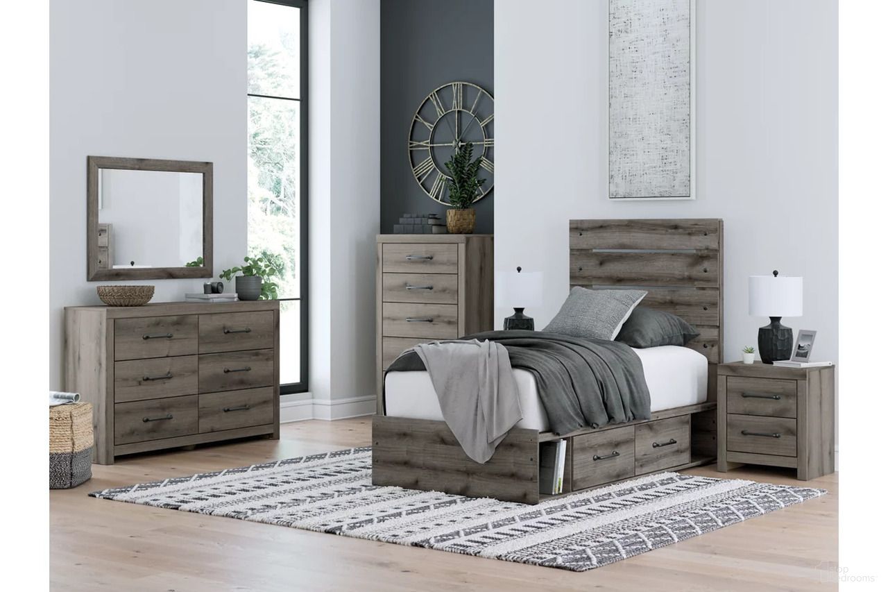 The appearance of Fondenlane Youth Panel Bed Bedroom Set with Storage In Brown Gray designed by Signature Design by Ashley in the transitional interior design. This brown gray piece of furniture was selected by 1StopBedrooms from Fondenlane Collection to add a touch of cosiness and style into your home. Sku: B100-11;NCB2405-50;NCB2405-50;NCB2405-53;NCB2405-92. Bed Type: Panel Bed. Material: Wood. Bed Size: Twin.