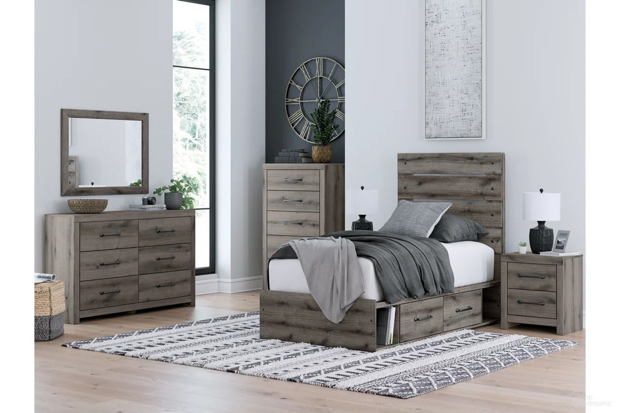 The appearance of Fondenlane Youth Panel Storage Bedroom Set In Brown Gray designed by Signature Design by Ashley in the transitional interior design. This brown gray piece of furniture  was selected by 1StopBedrooms from Fondenlane Collection to add a touch of cosiness and style into your home. Sku: B100-11;NCB2405-150;NCB2405-53;NCB2405-92. Bed Type: Storage Bed. Material: Wood. Bed Size: Twin.