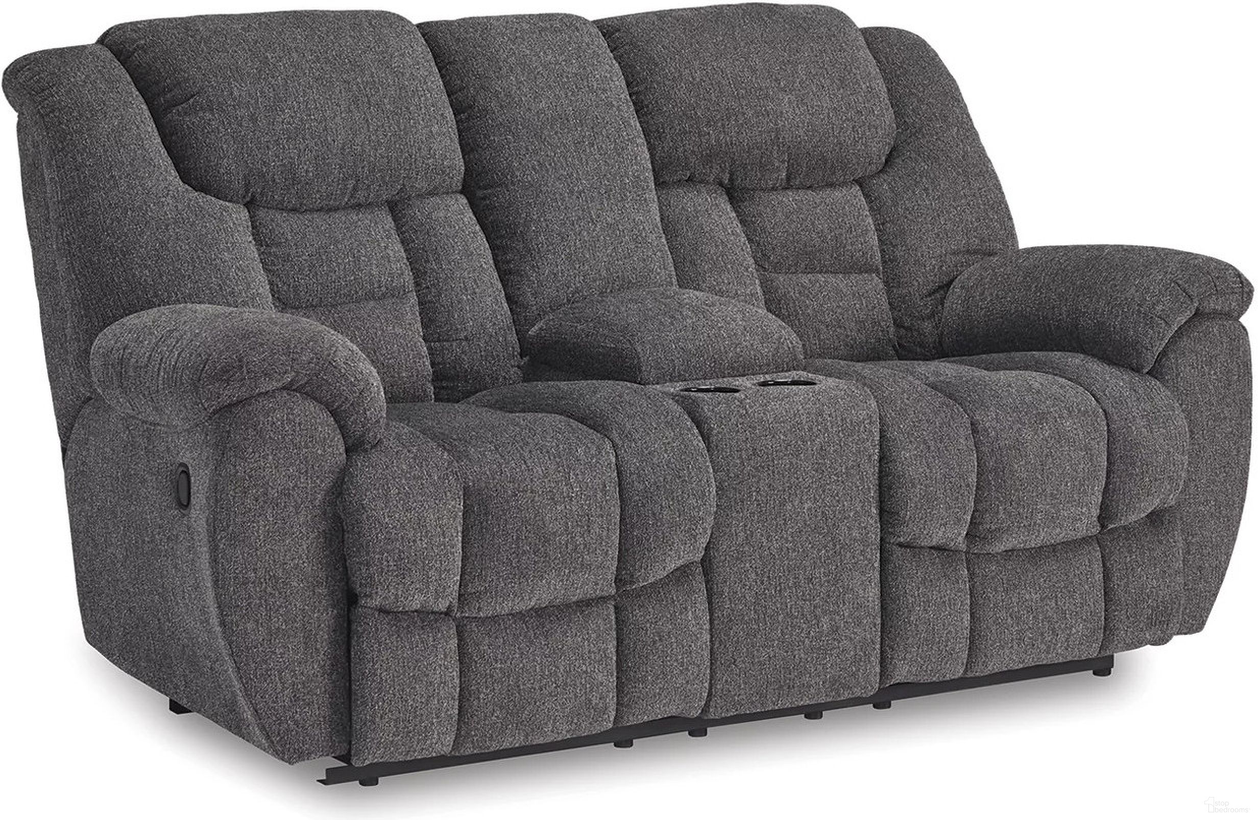 The appearance of Foreside Reclining Loveseat with Console In Charcoal designed by Signature Design by Ashley in the modern / contemporary interior design. This charcoal piece of furniture  was selected by 1StopBedrooms from Foreside Collection to add a touch of cosiness and style into your home. Sku: 3810494. Material: Polyester.