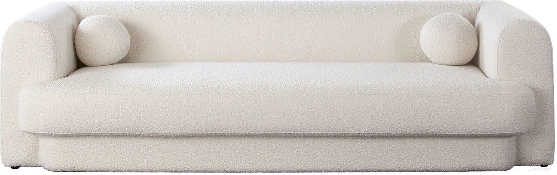 The appearance of Form Sofa In Ivory Boucle Fabric with 2 Accent Pillow Balls designed by Diamond Sofa in the modern / contemporary interior design. This ivory piece of furniture was selected by 1StopBedrooms from Form Collection to add a touch of cosiness and style into your home. Sku: FORMSOIV. Material: Boucle.
