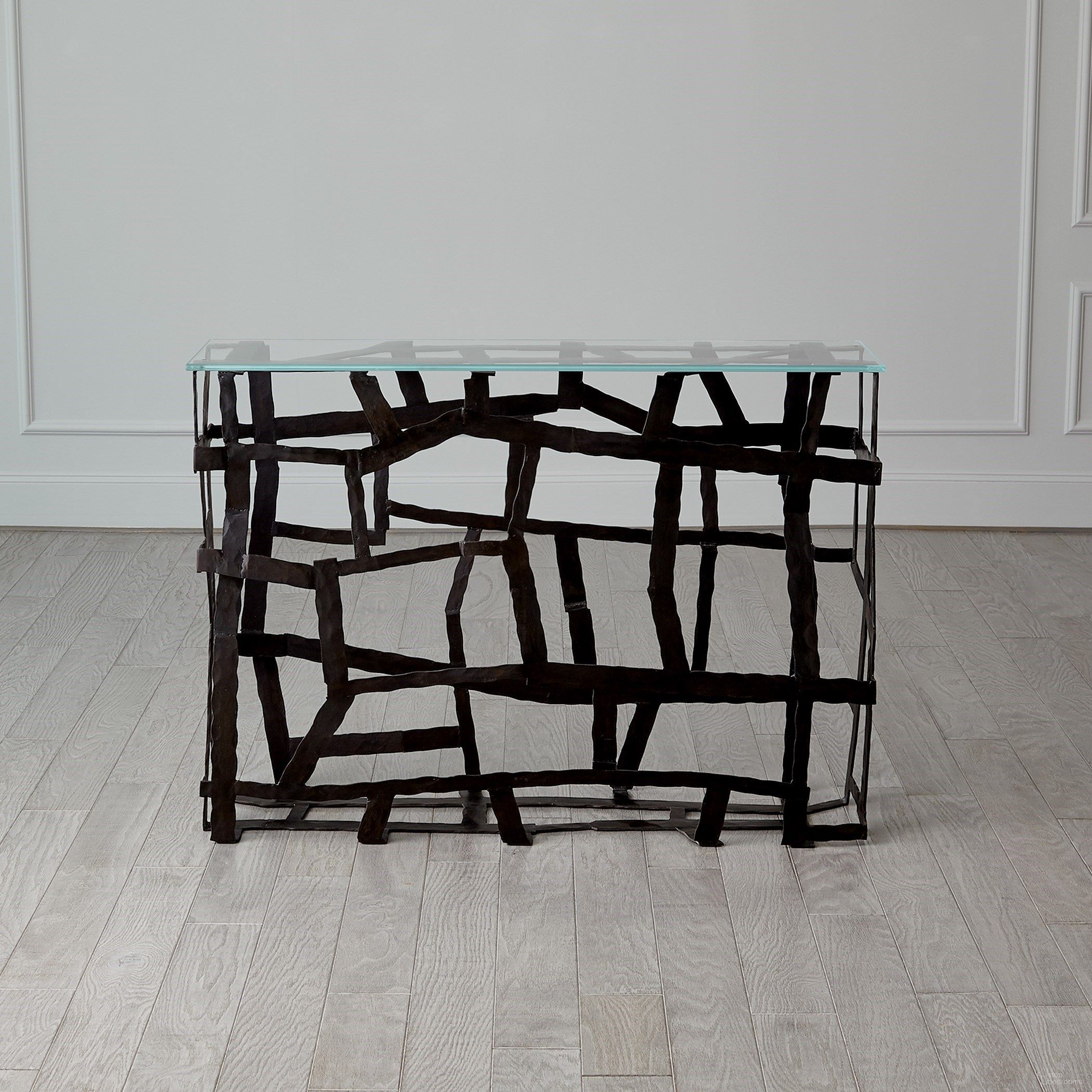 The appearance of Fragments Console In Blackened Iron designed by Global Views in the modern / contemporary interior design. This black piece of furniture  was selected by 1StopBedrooms from Fragments Collection to add a touch of cosiness and style into your home. Sku: 791586. Material: Iron.