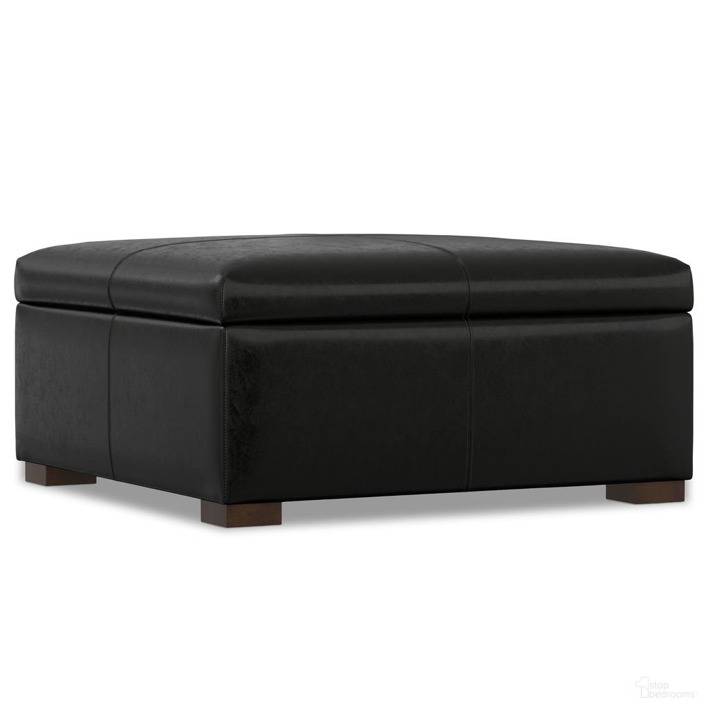The appearance of Gabbie Faux Leather Square Coffee Table Storage Ottoman In Midnight Black designed by Simpli Home in the modern / contemporary interior design. This midnight black piece of furniture was selected by 1StopBedrooms from Gabbie Collection to add a touch of cosiness and style into your home. Sku: AXCOT-GABSQ-BL. Material: Rubberwood.