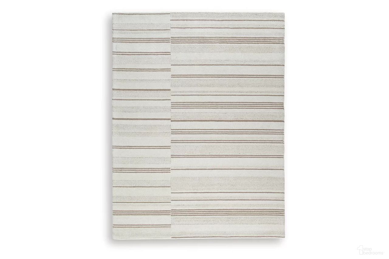 The appearance of Gadence 7'8" x 10' Area Rug In Ivory and Tan designed by Signature Design by Ashley in the transitional interior design. This ivory and tan piece of furniture was selected by 1StopBedrooms from Gadence Collection to add a touch of cosiness and style into your home. Sku: R407641.