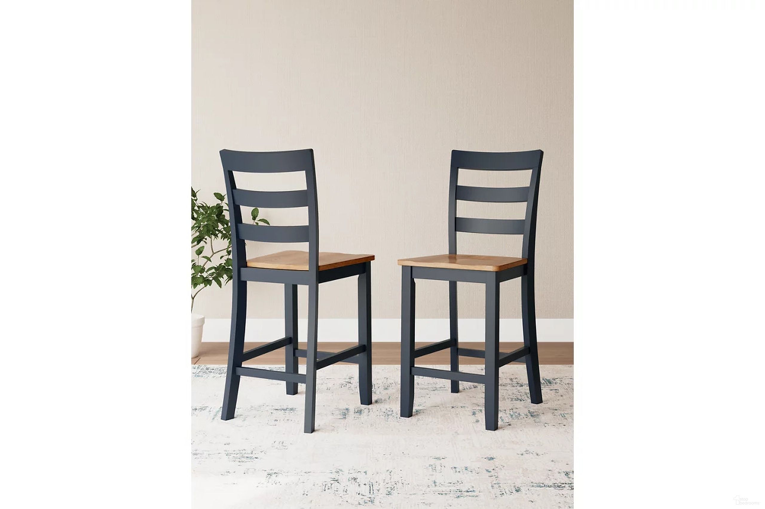 The appearance of Gesthaven Counter Height Barstool Set of 2 In Natural and Blue designed by Signature Design by Ashley in the transitional interior design. This natural and blue piece of furniture  was selected by 1StopBedrooms from Gesthaven Collection to add a touch of cosiness and style into your home. Sku: D399-124. Material: Wood.